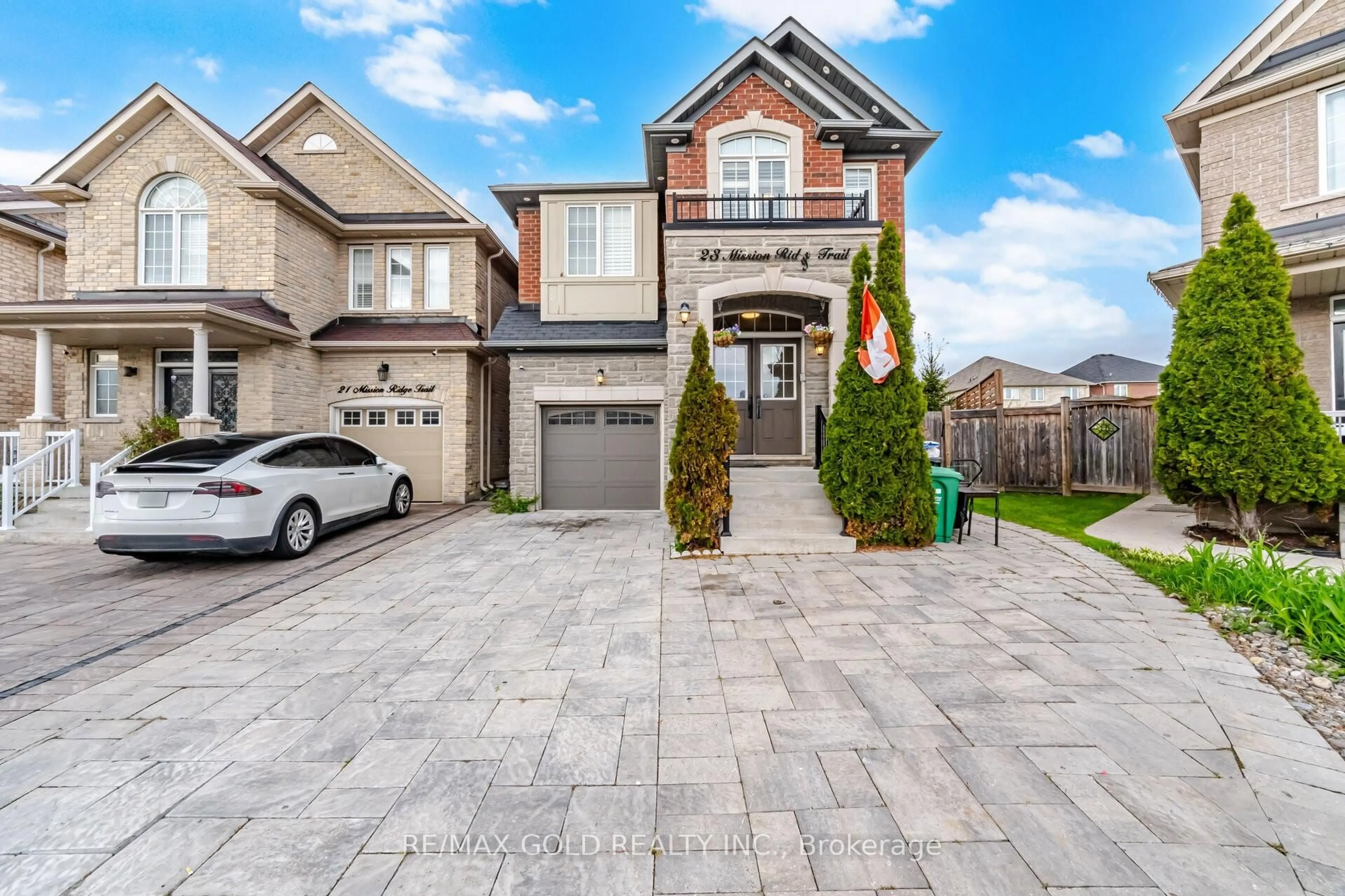 Home with brick exterior material, street for 23 Mission Ridge Tr, Brampton Ontario L6P 3A2