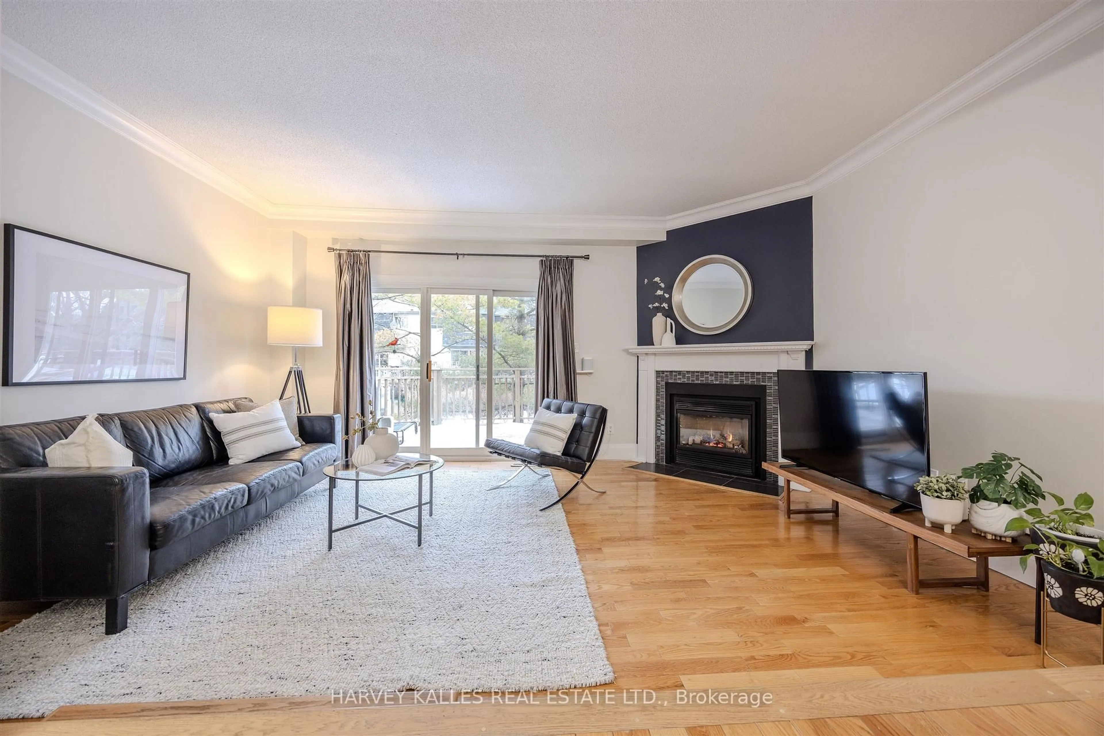 Living room with furniture, wood/laminate floor for 1060 Walden Circ #50, Mississauga Ontario L5J 4J9