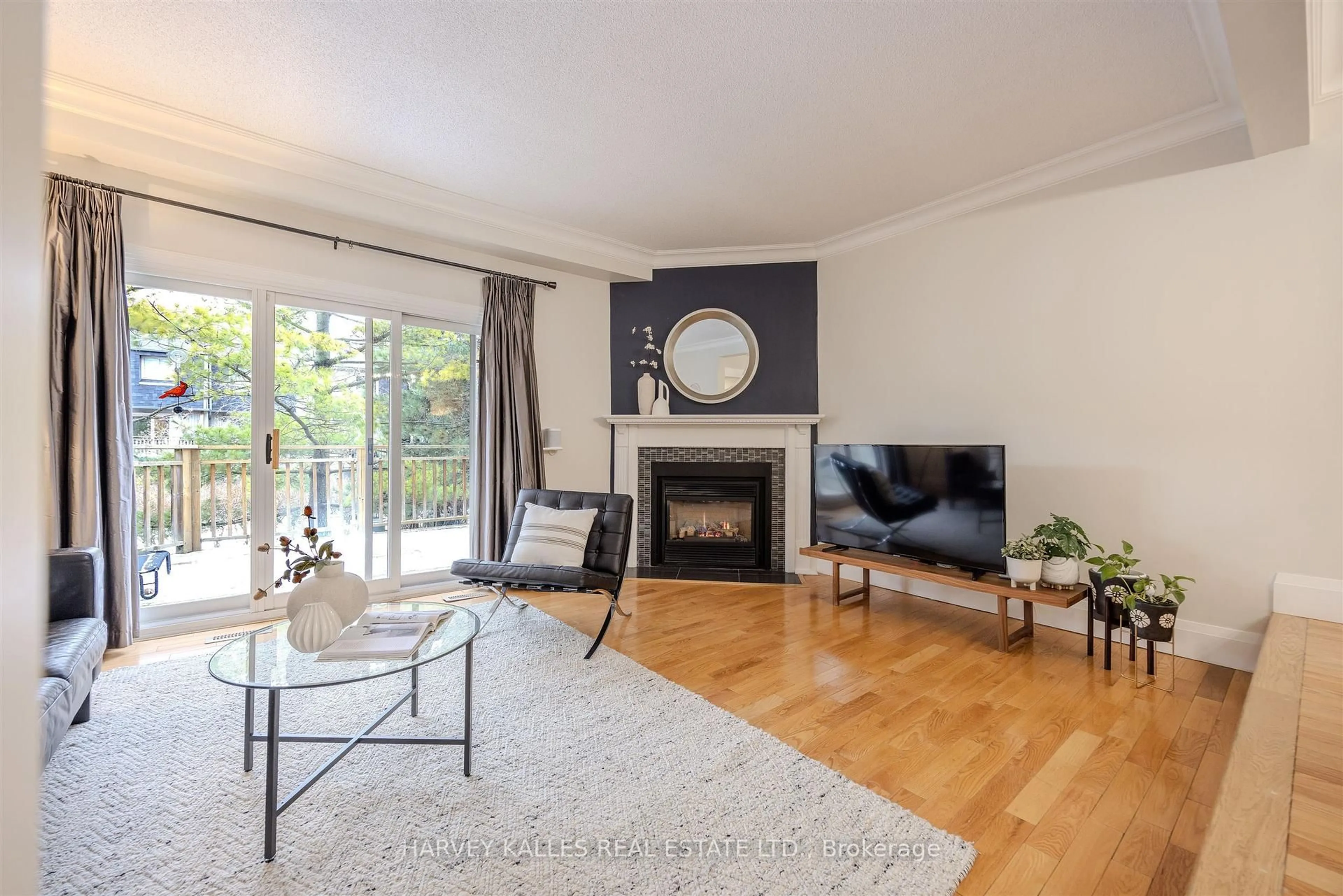 Living room with furniture, wood/laminate floor for 1060 Walden Circ #50, Mississauga Ontario L5J 4J9