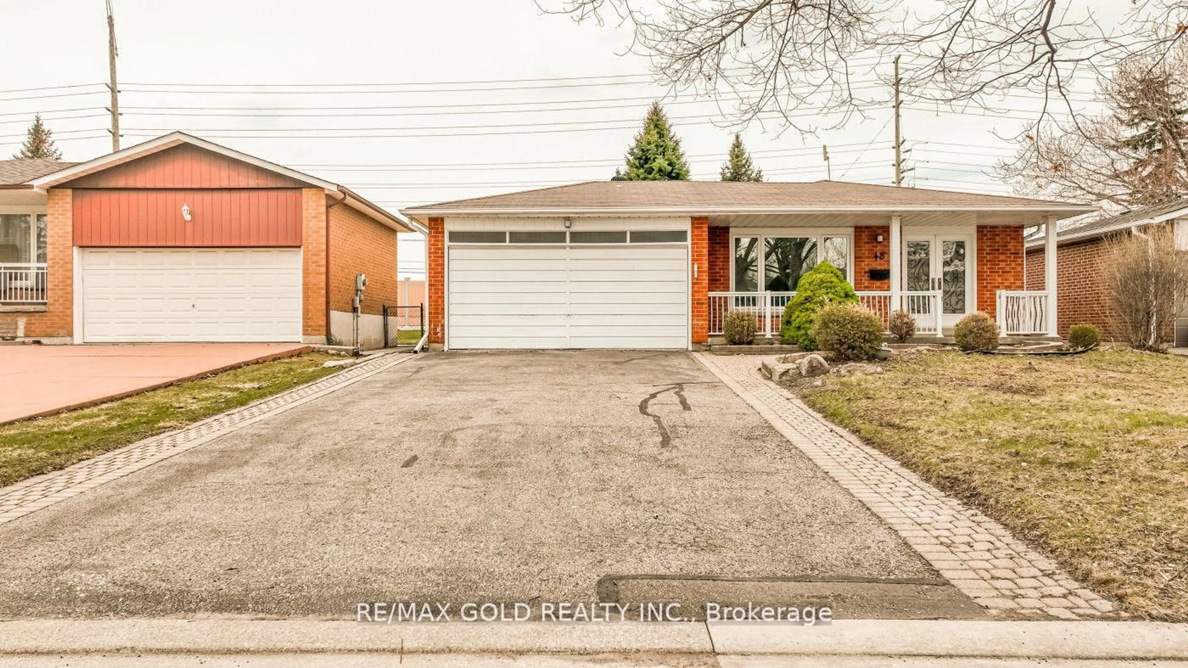 Home with brick exterior material, street for 48 Malcolm Cres, Brampton Ontario L6S 3C8