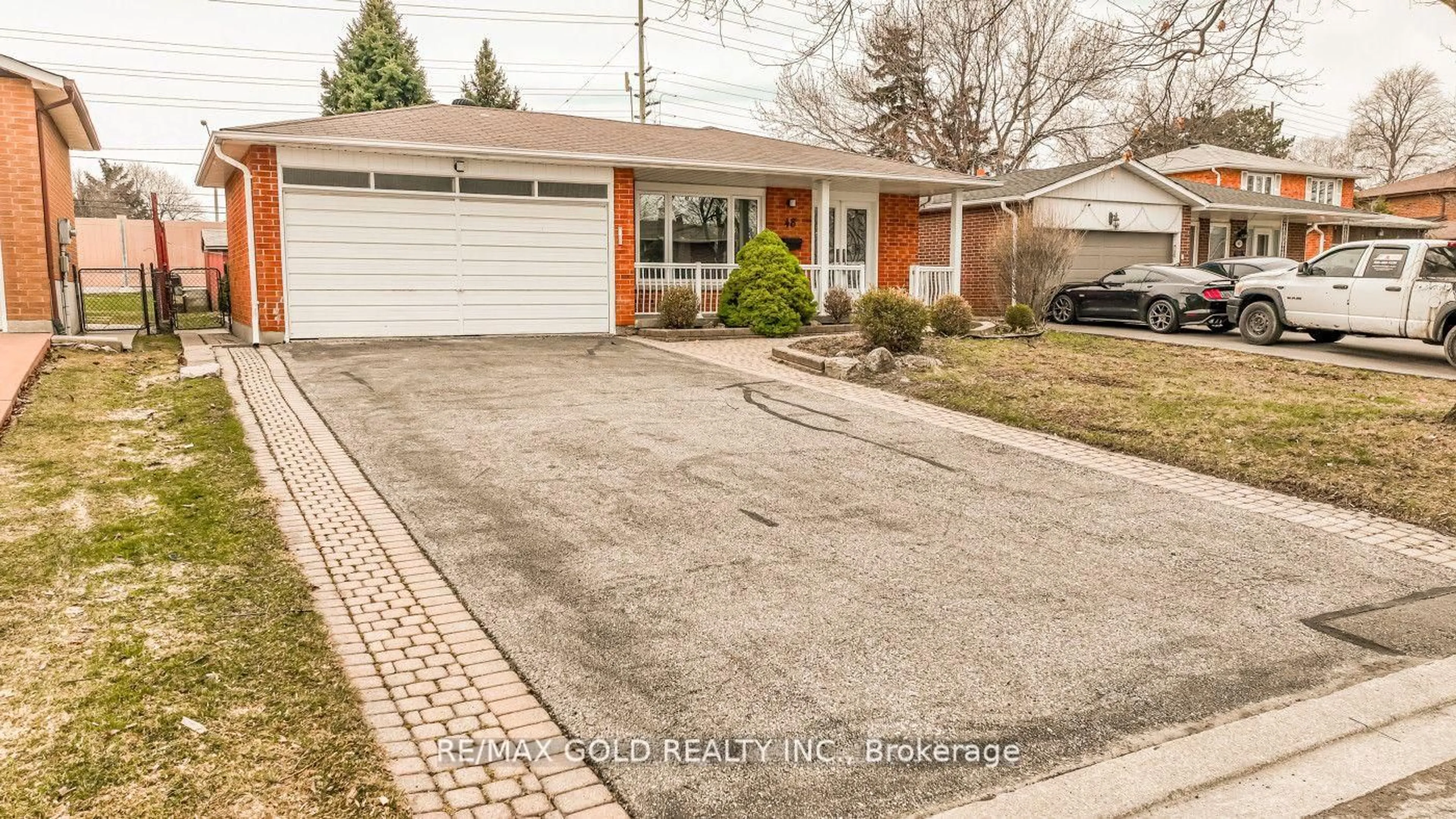 Home with brick exterior material, street for 48 Malcolm Cres, Brampton Ontario L6S 3C8