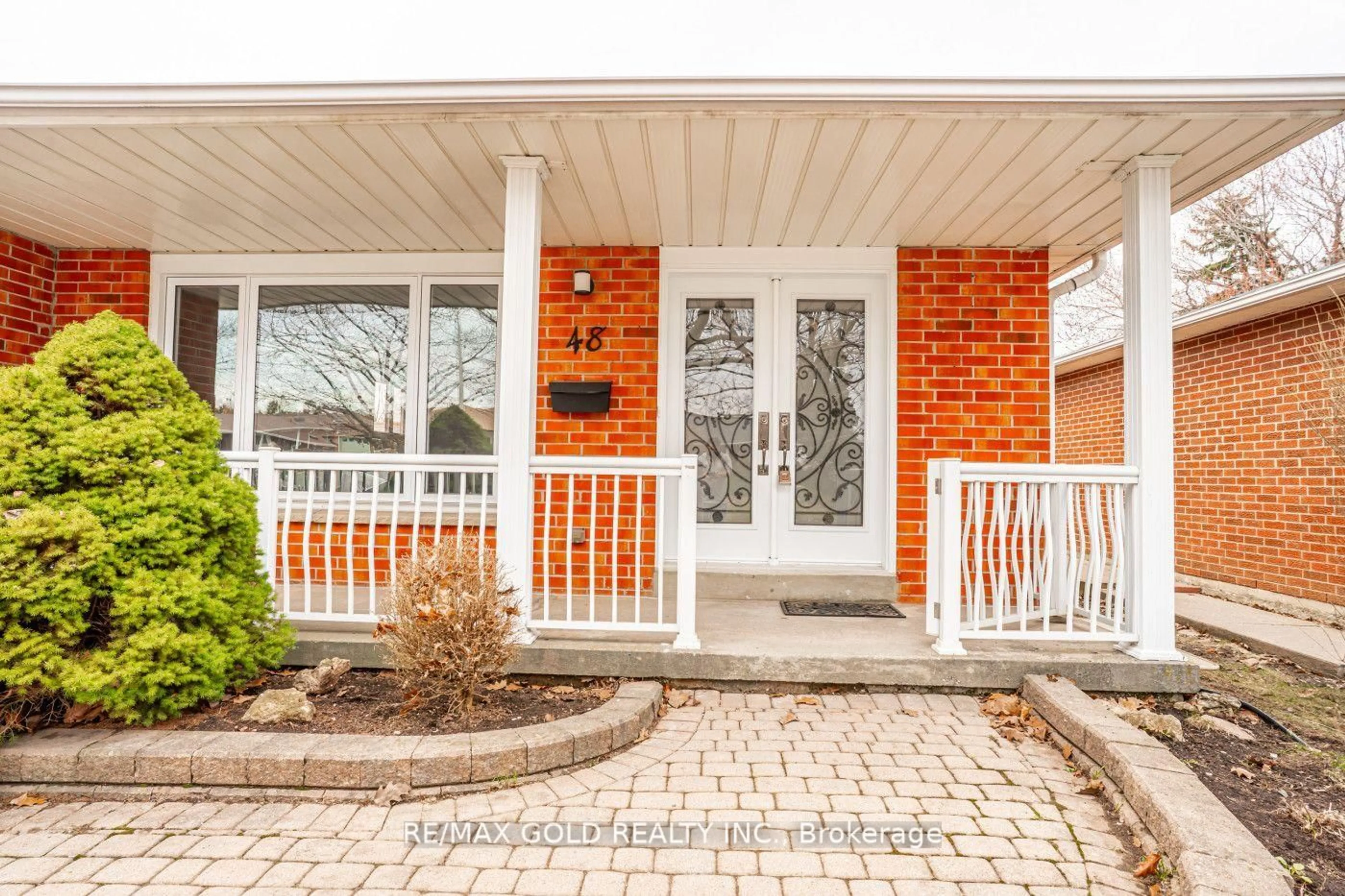 Home with brick exterior material, street for 48 Malcolm Cres, Brampton Ontario L6S 3C8