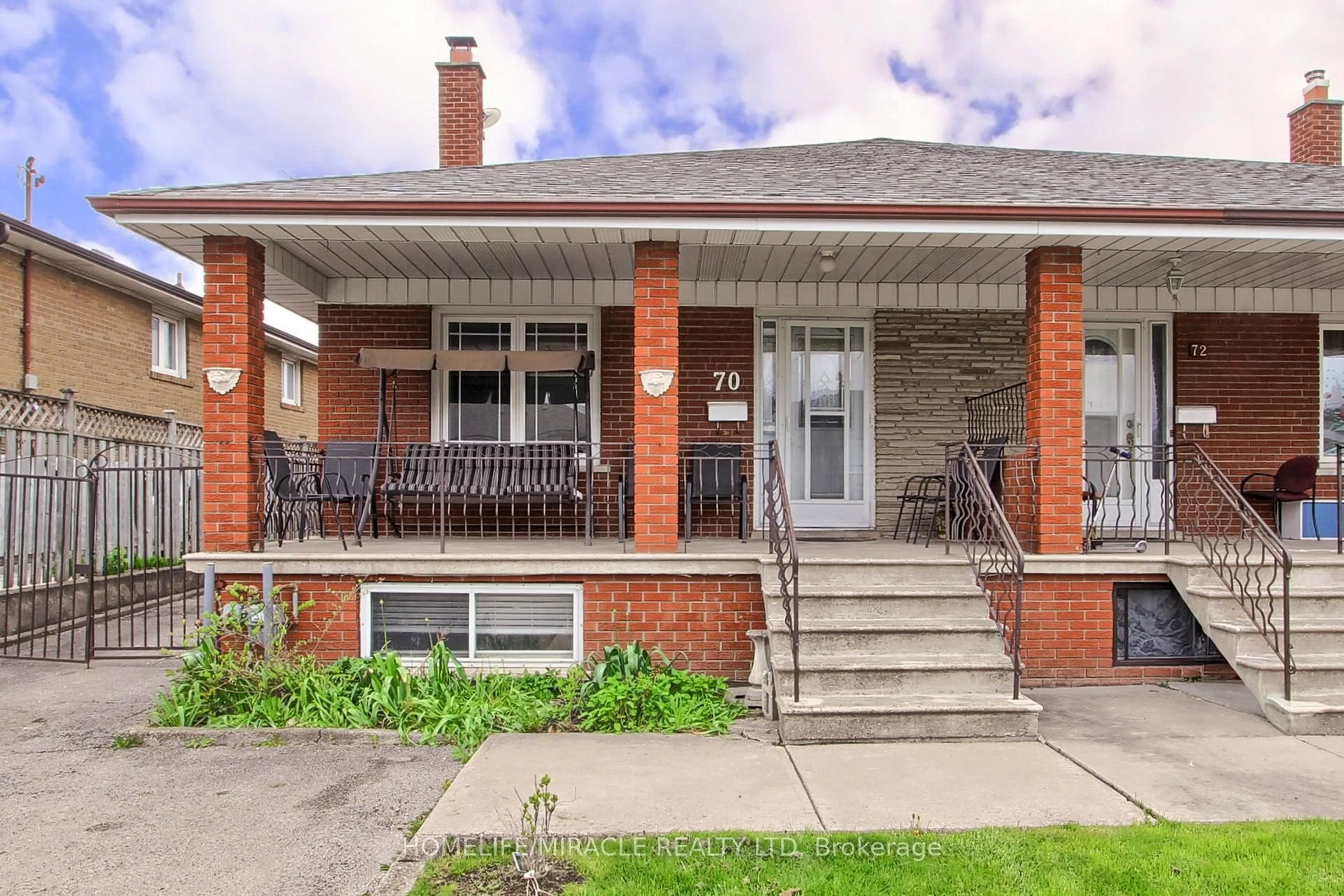 Home with brick exterior material, street for 70 Dolores Rd, Toronto Ontario M3L 2A9