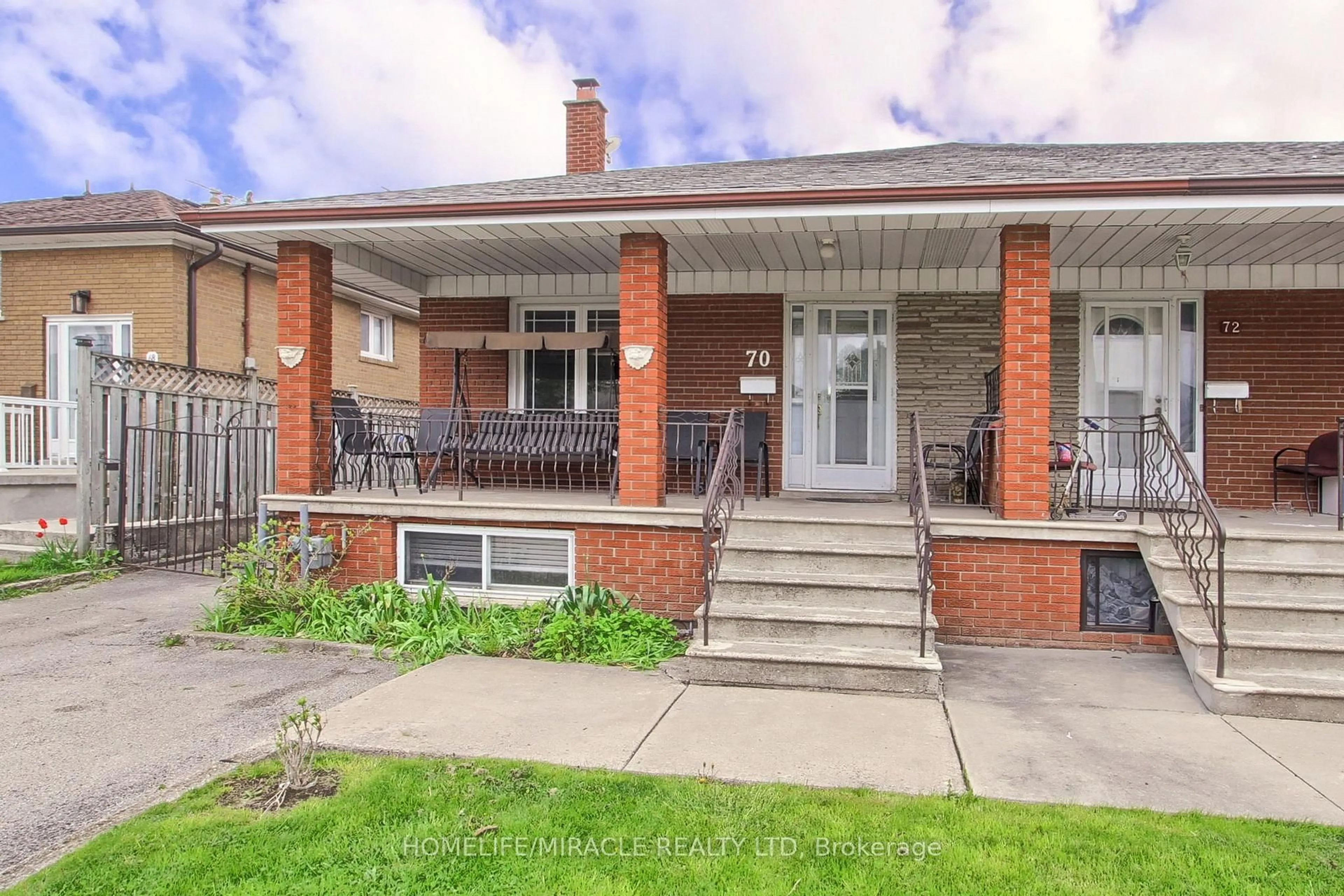 Home with brick exterior material, street for 70 Dolores Rd, Toronto Ontario M3L 2A9
