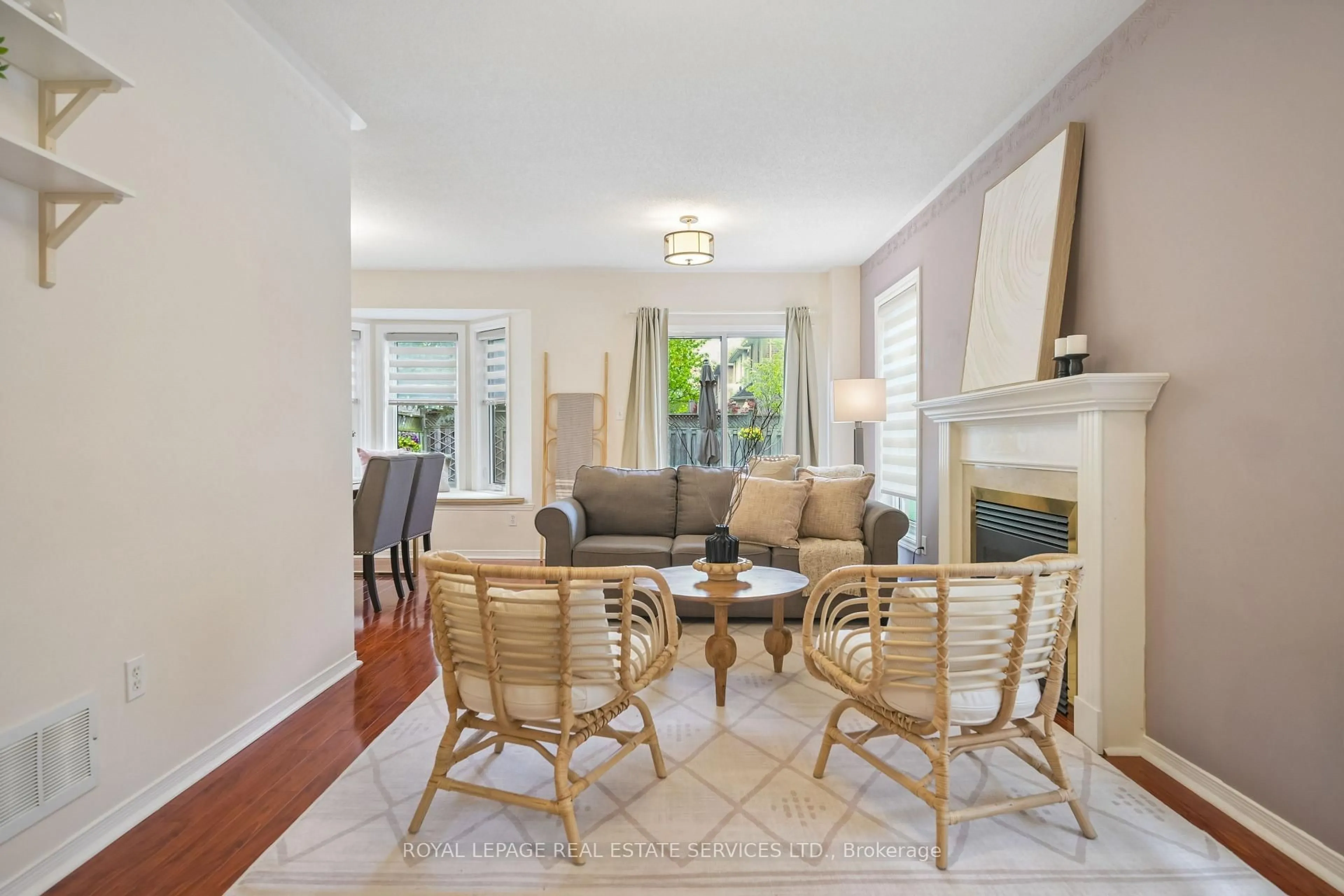 Living room with furniture, wood/laminate floor for 2023 Shady Glen Rd, Oakville Ontario L6M 3T4