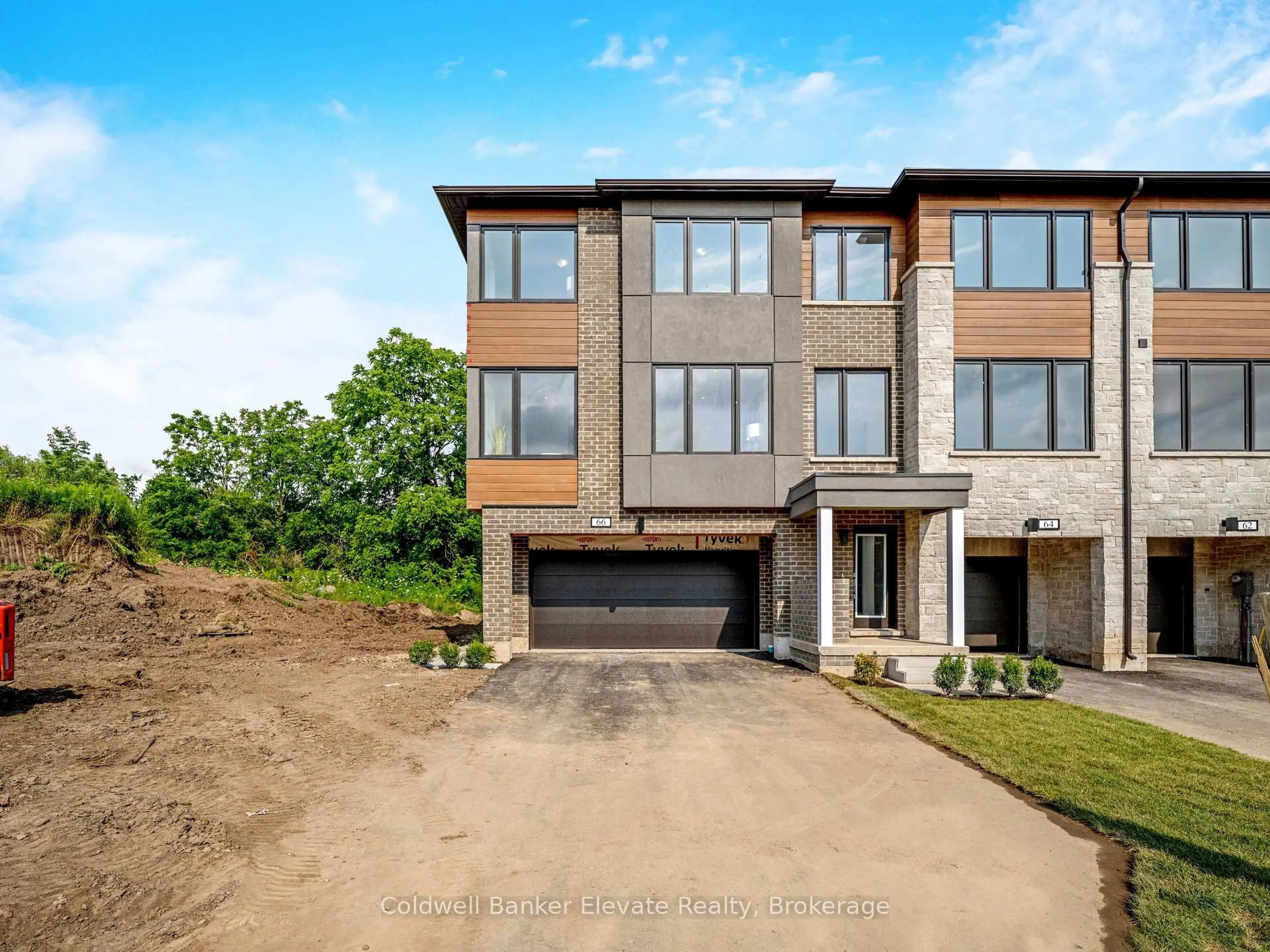 Home with brick exterior material, street for 66 Windtree Way, Halton Hills Ontario L7G 0P6