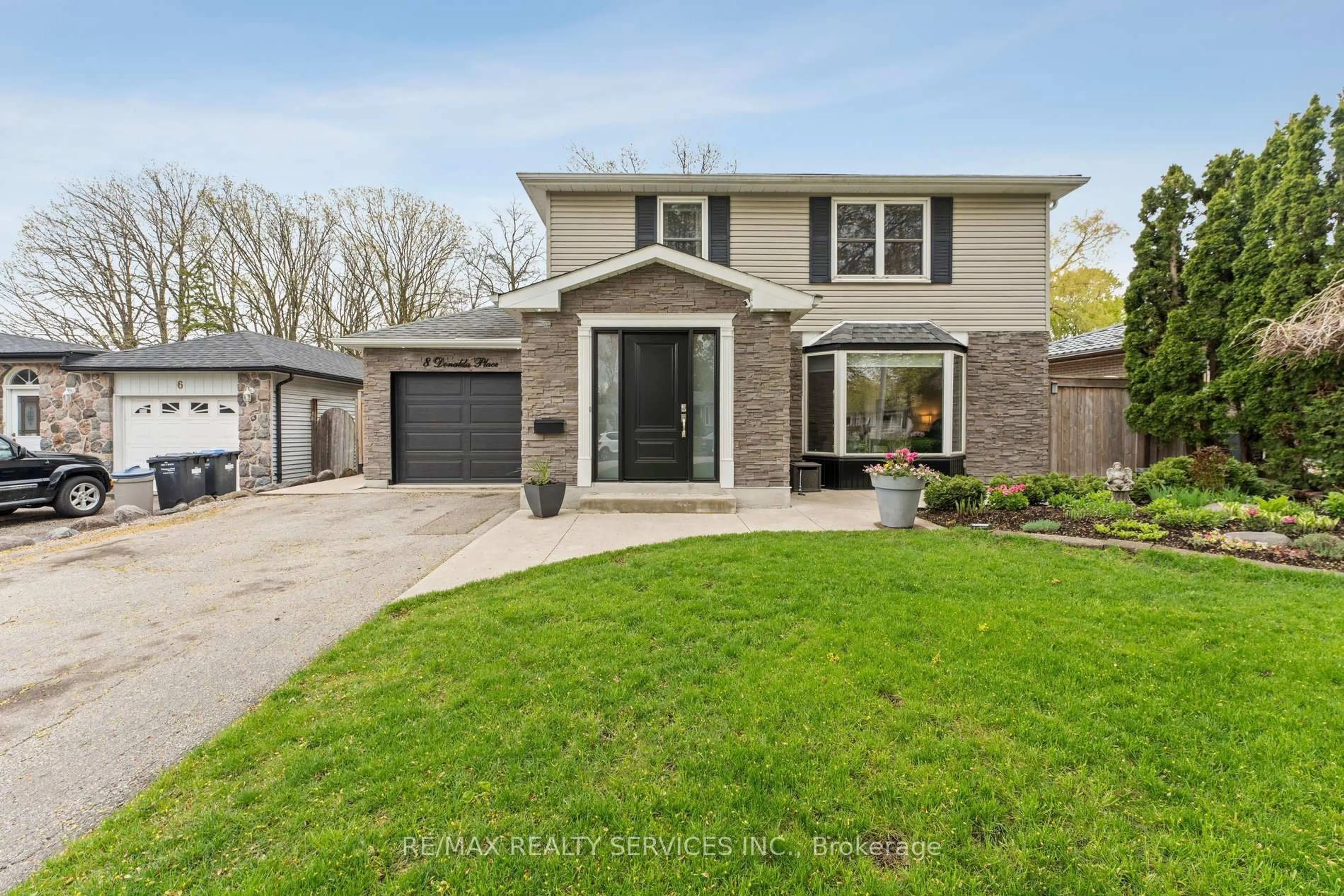 Home with brick exterior material, street for 8 Donalda Pl, Brampton Ontario L6T 1S4