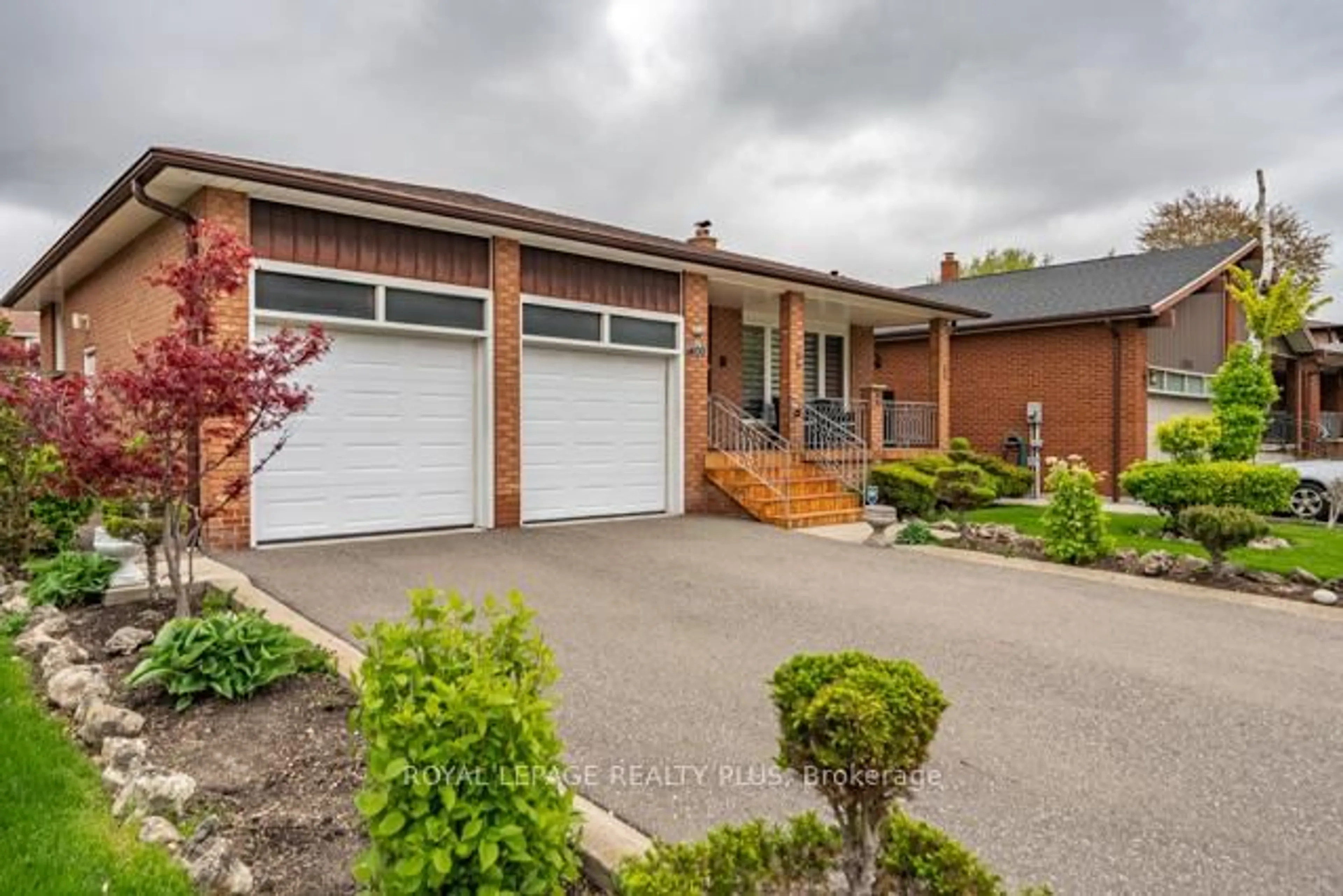Home with brick exterior material, street for 1400 Bough Beeches Blvd, Mississauga Ontario L4W 3B5