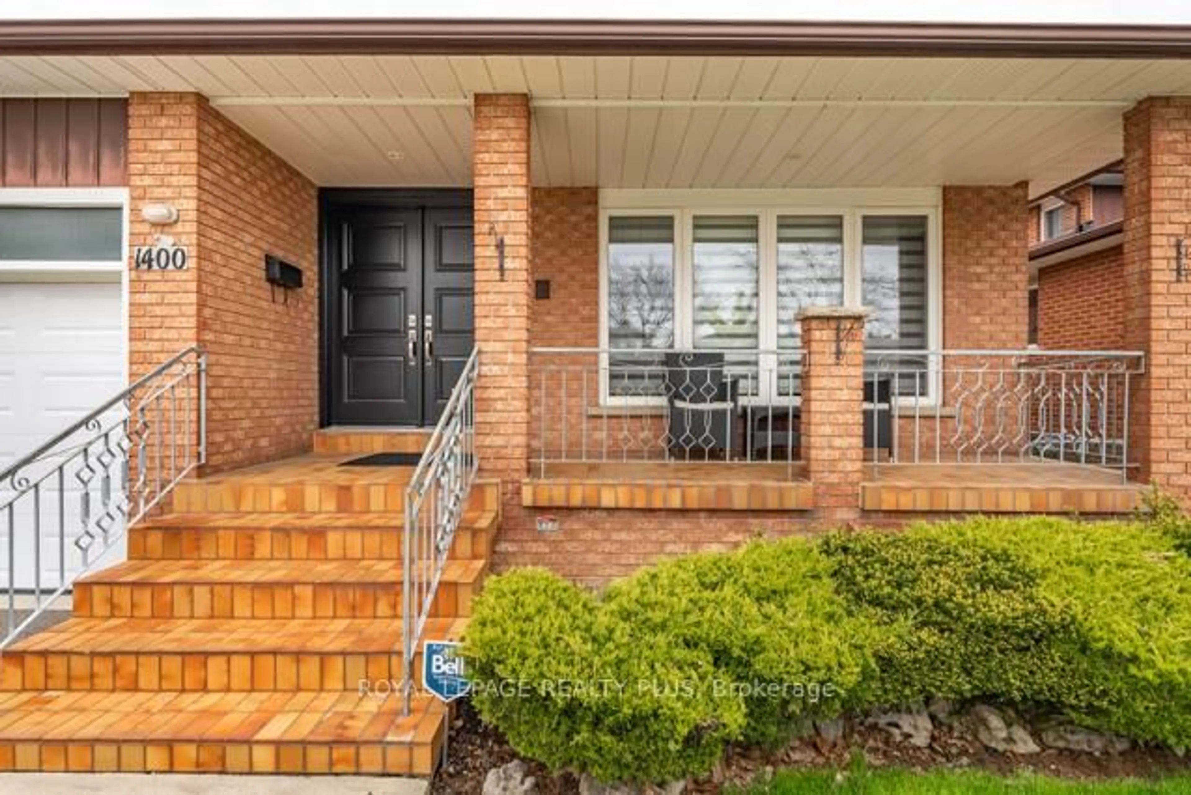 Home with brick exterior material, street for 1400 Bough Beeches Blvd, Mississauga Ontario L4W 3B5