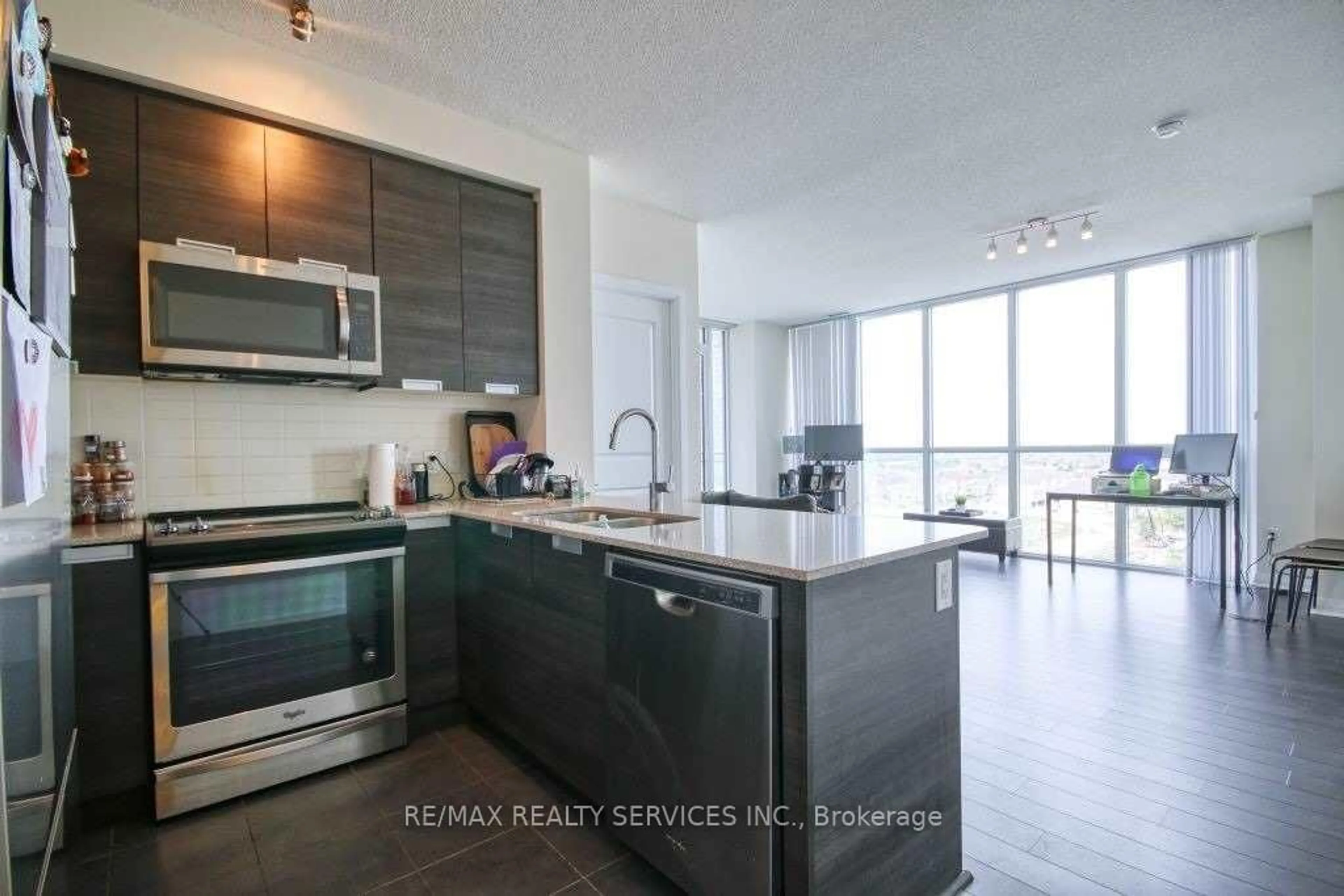 Open concept kitchen, ceramic/tile floor for 5025 Four Springs Ave #1202, Mississauga Ontario L5R 0G5