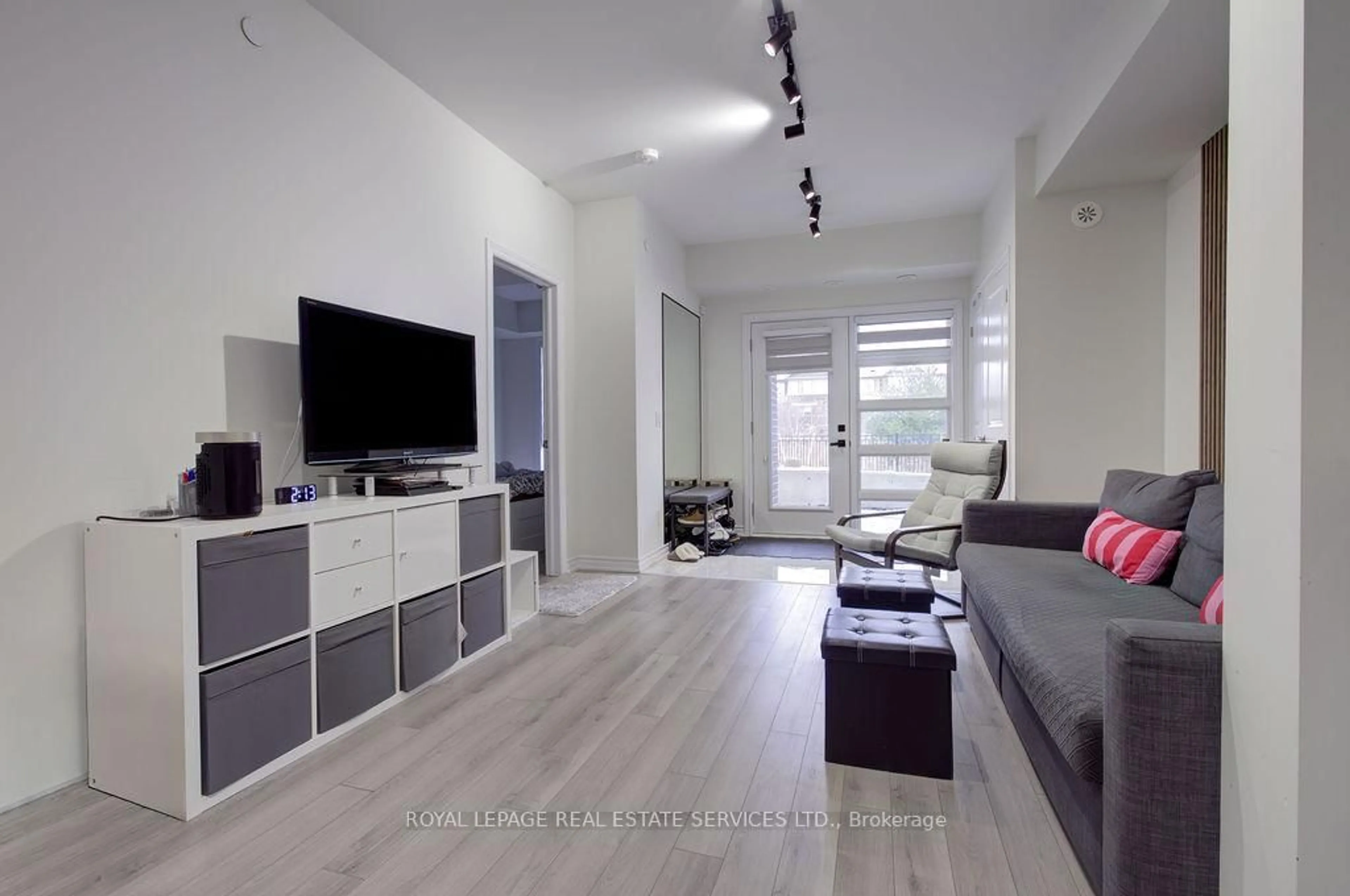 Living room with furniture, unknown for 349 Wheat Boom Dr #123, Oakville Ontario L6H 7X5