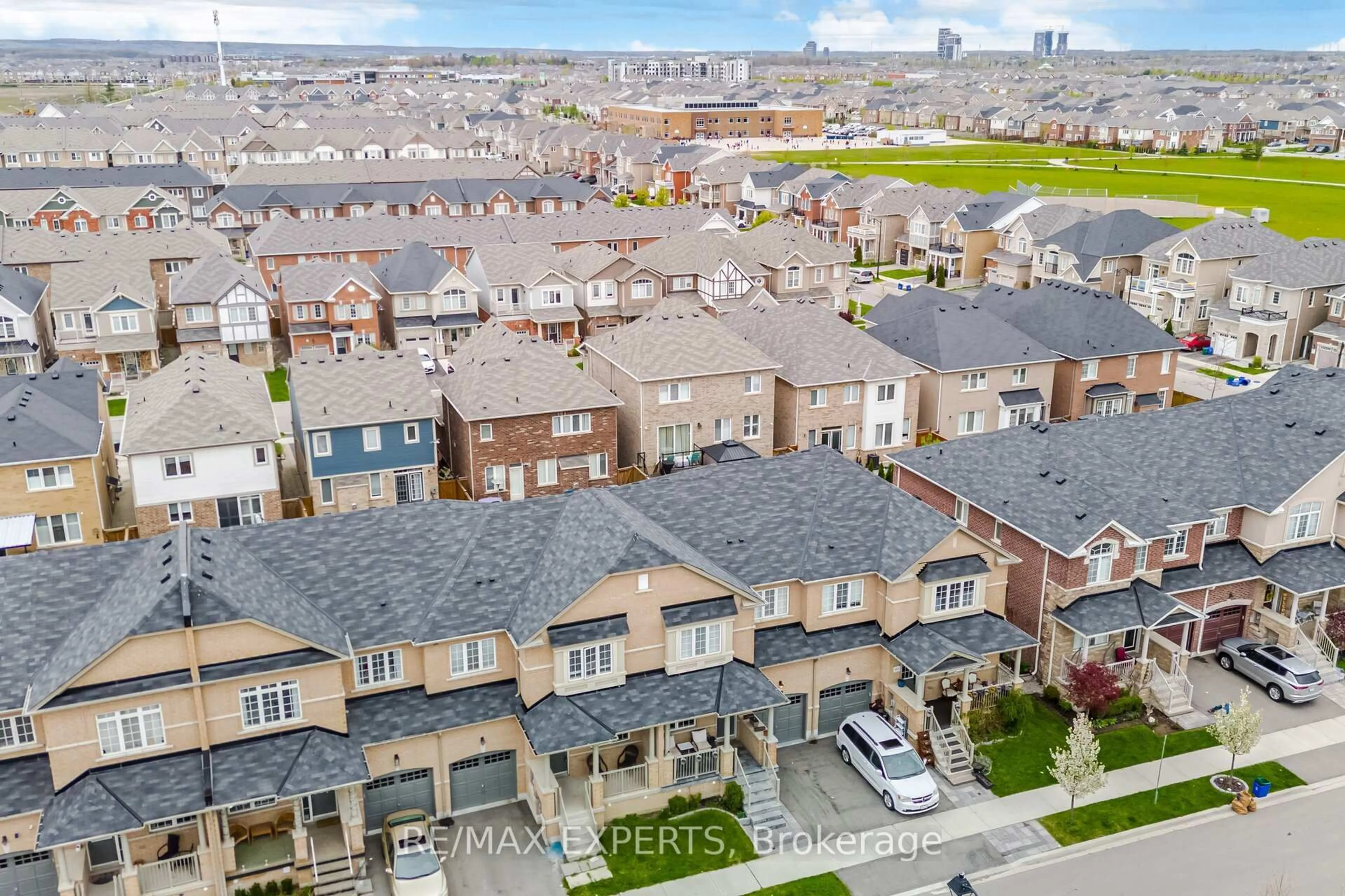 A pic from outside/outdoor area/front of a property/back of a property/a pic from drone, city buildings view from balcony for 64 Holbrook Crt, Milton Ontario L9E 1J1