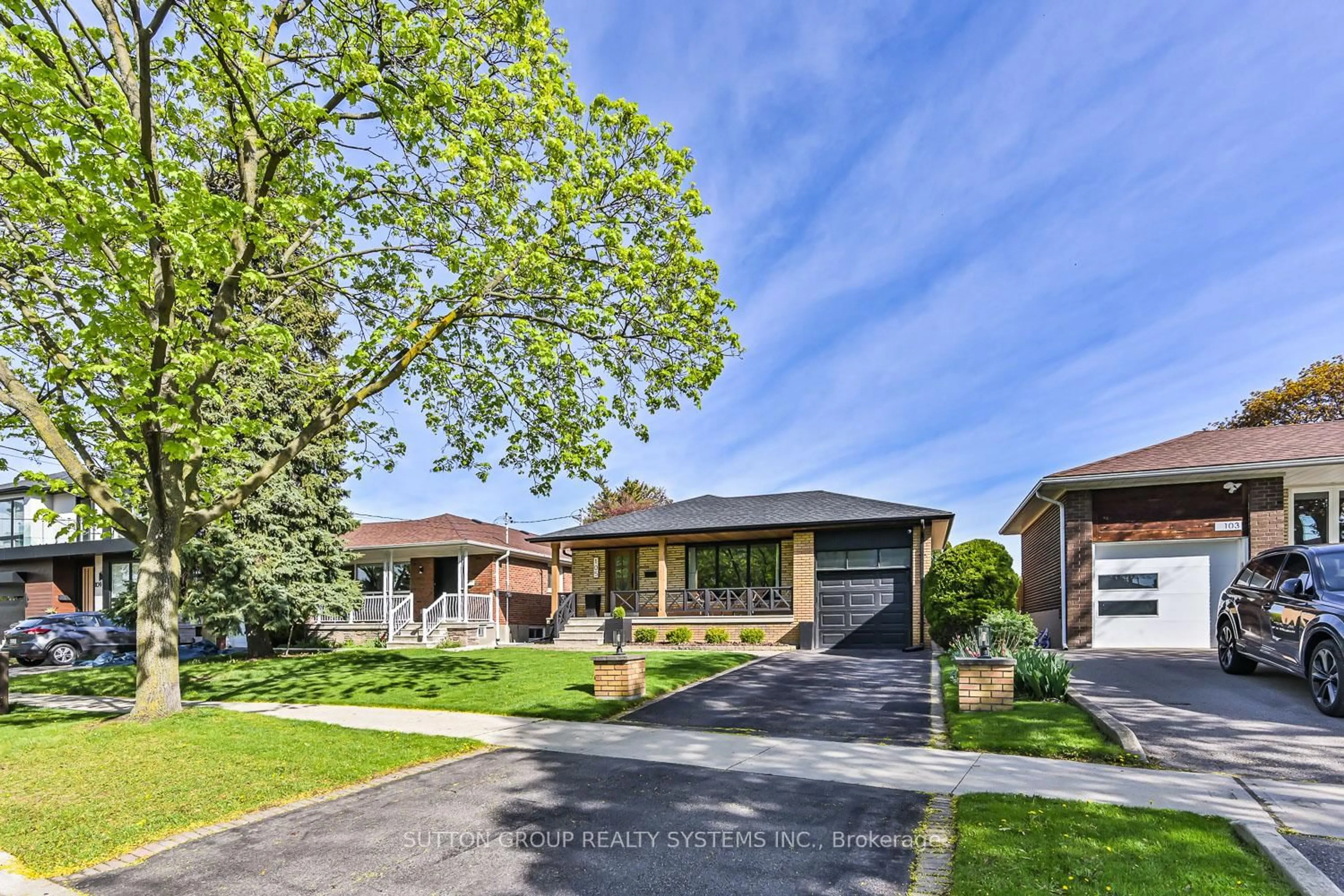 Home with brick exterior material, street for 105 Crendon Dr, Toronto Ontario M9C 3H7