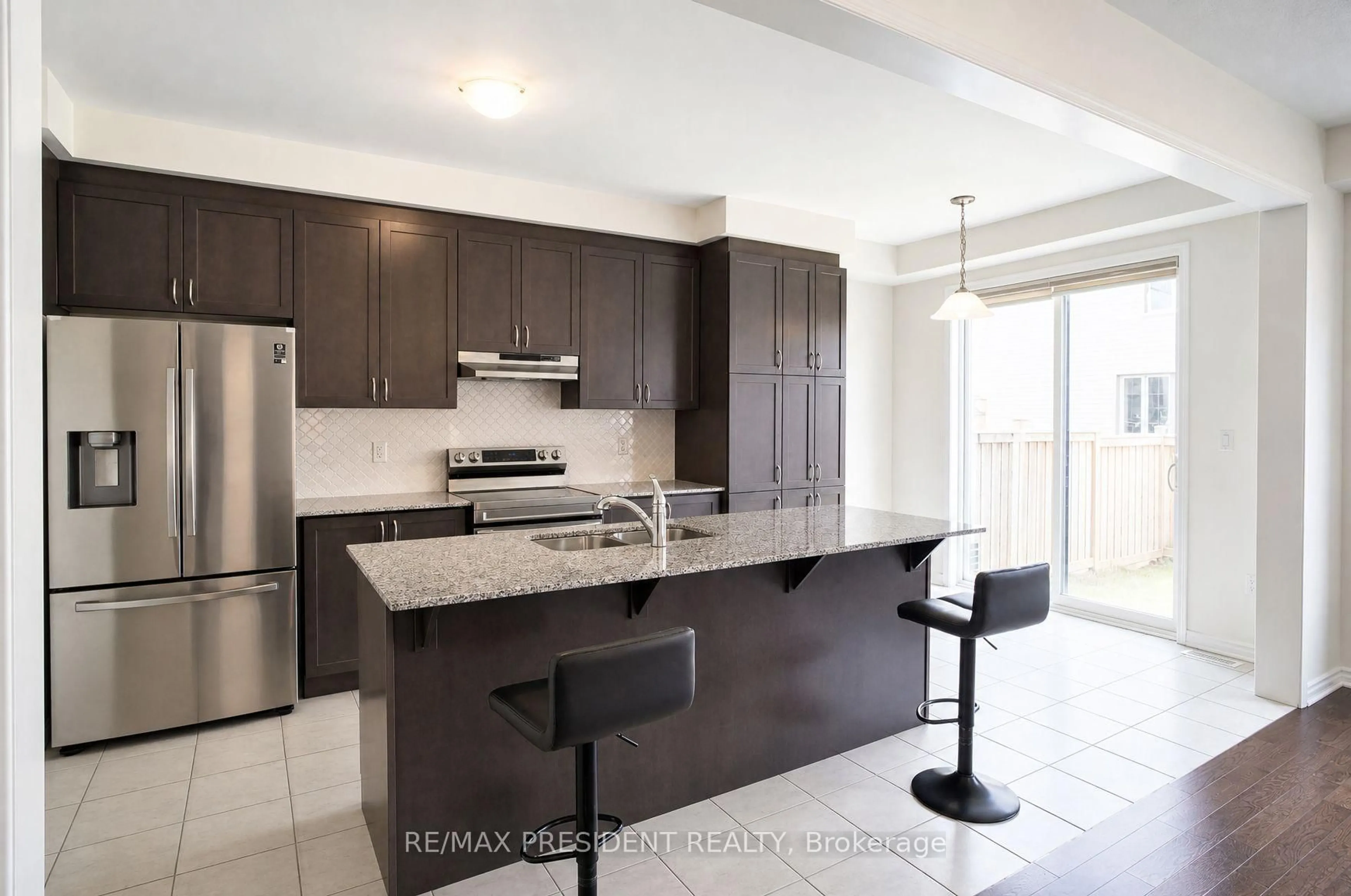 Open concept kitchen, ceramic/tile floor for 34 Eberly Woods Dr, Caledon Ontario L7C 4J2