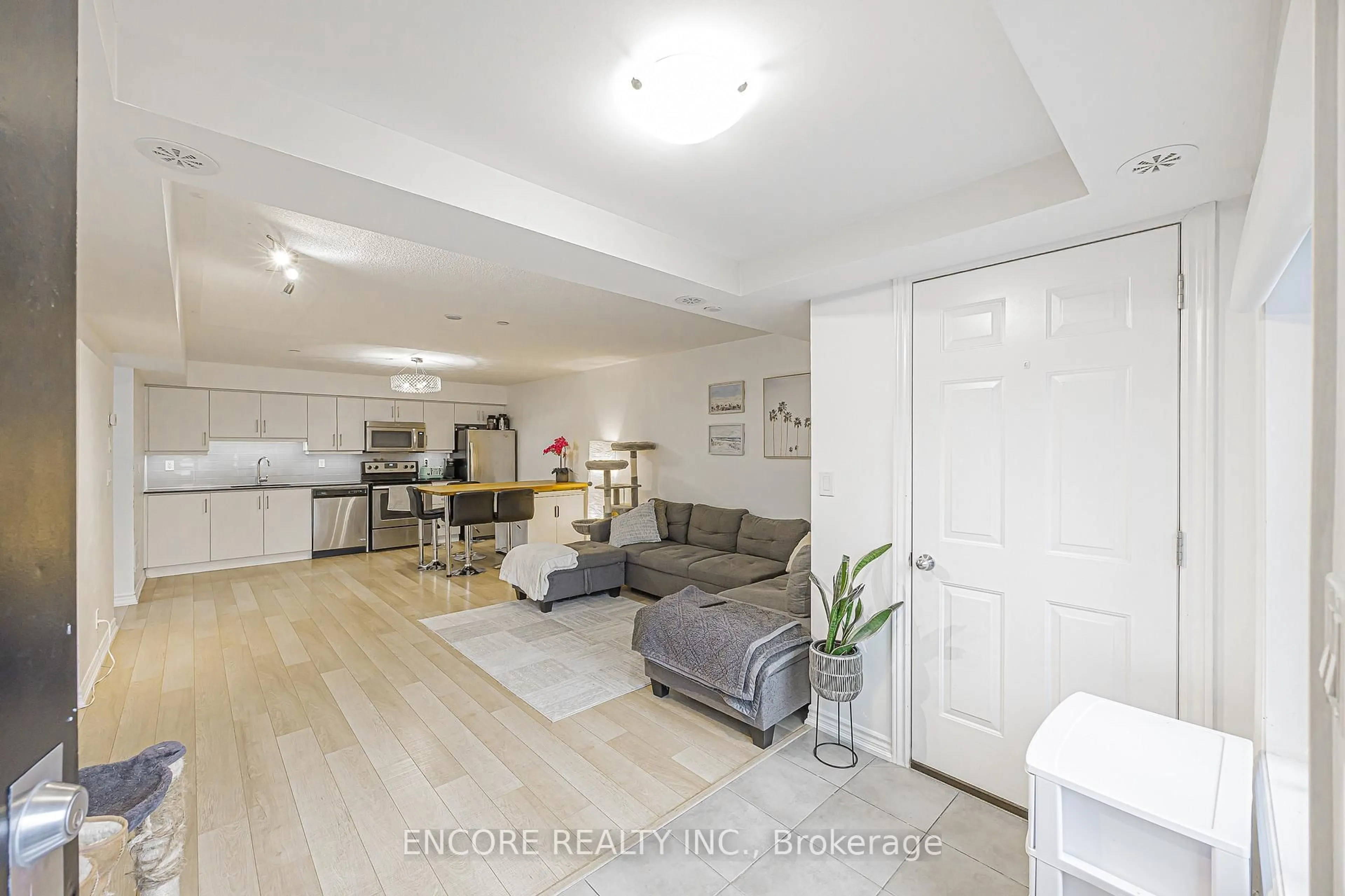 Living room with furniture, unknown for 10 Carnation Ave #8, Toronto Ontario M8V 0B8