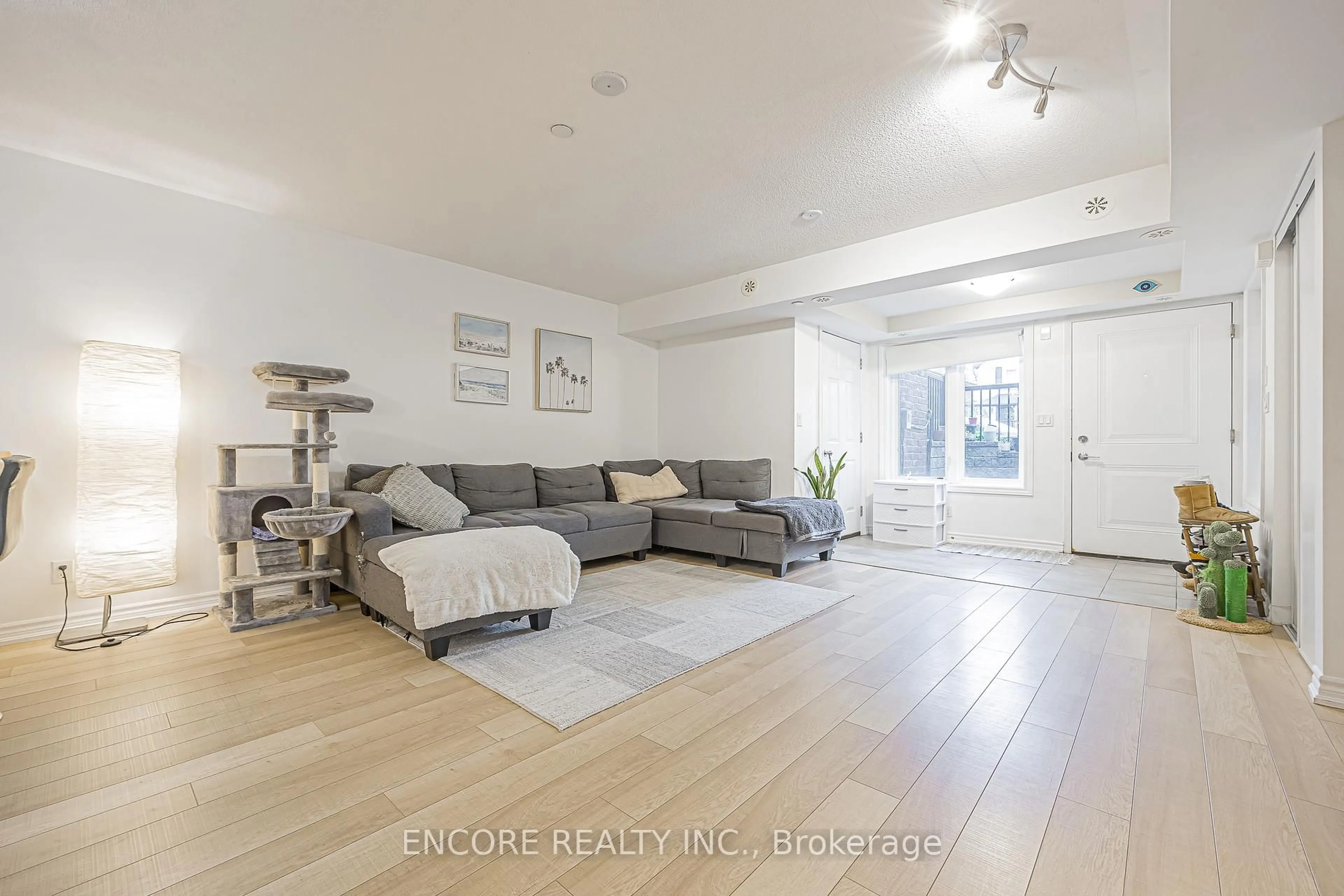 Living room with furniture, unknown for 10 Carnation Ave #8, Toronto Ontario M8V 0B8