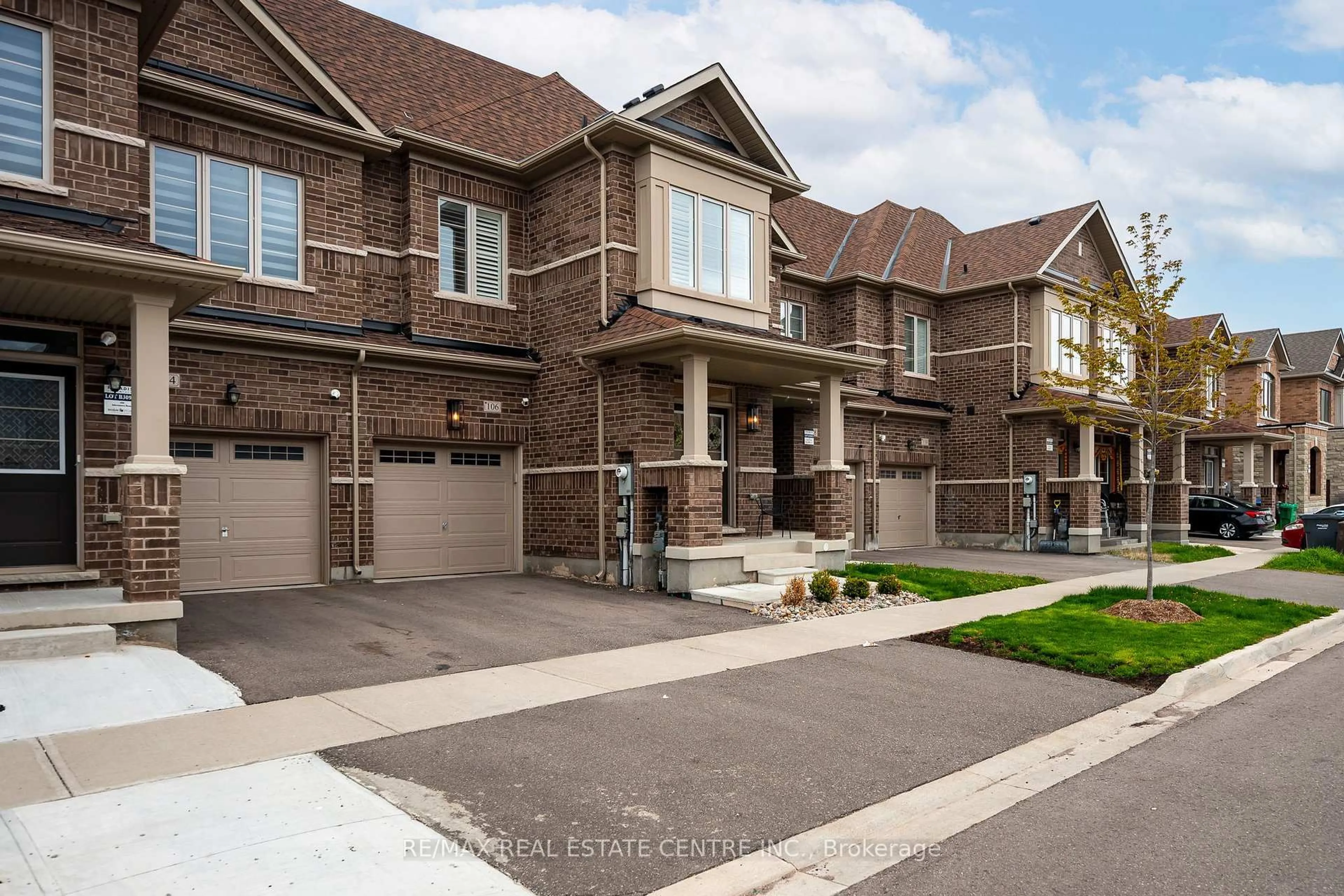 Home with brick exterior material, street for 106 ADVENTURA Rd, Brampton Ontario L7A 5A7