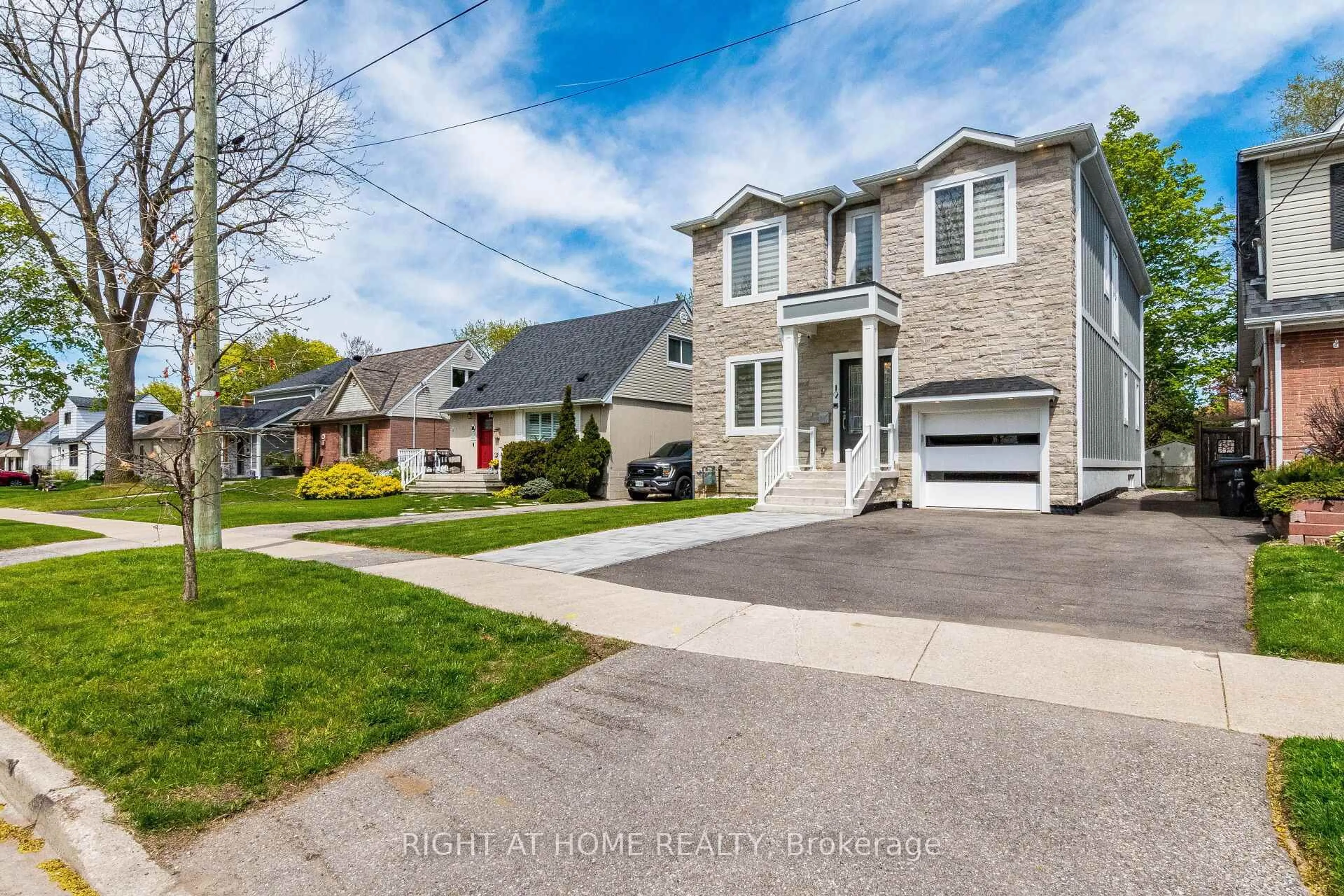 Home with brick exterior material, street for 12 Thames Ave, Toronto Ontario M8W 2N6