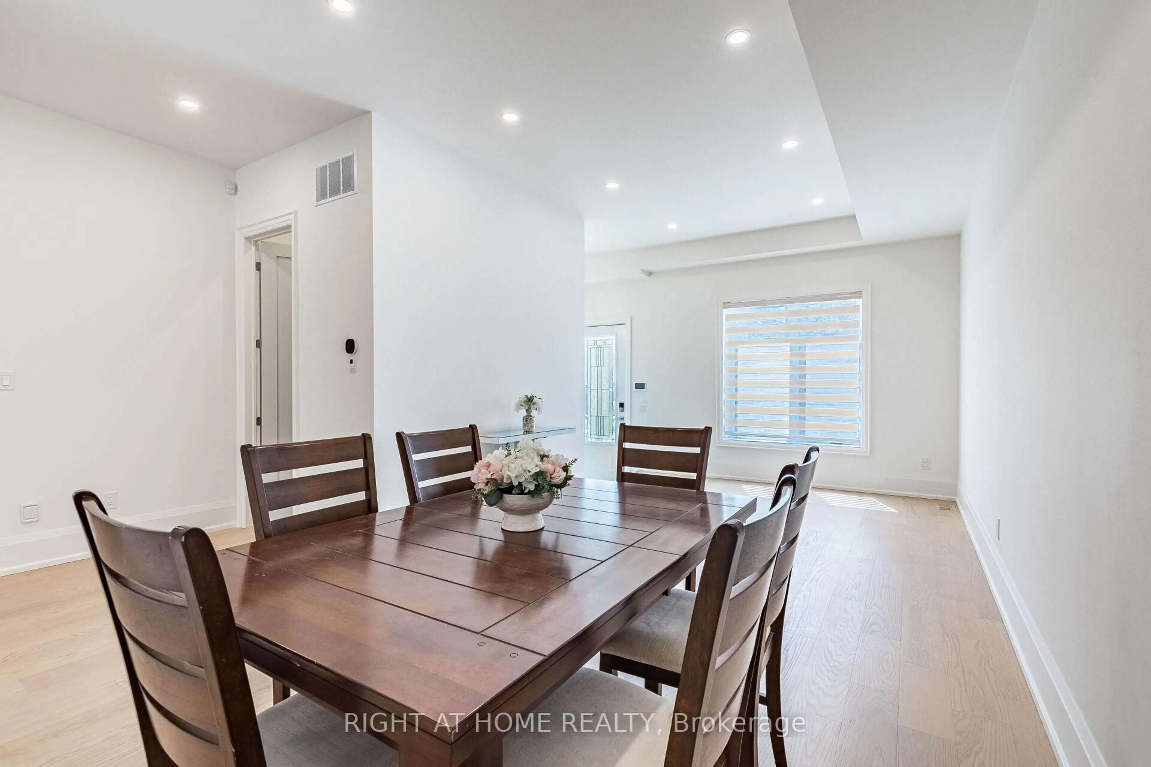 Dining room, wood/laminate floor for 12 Thames Ave, Toronto Ontario M8W 2N6