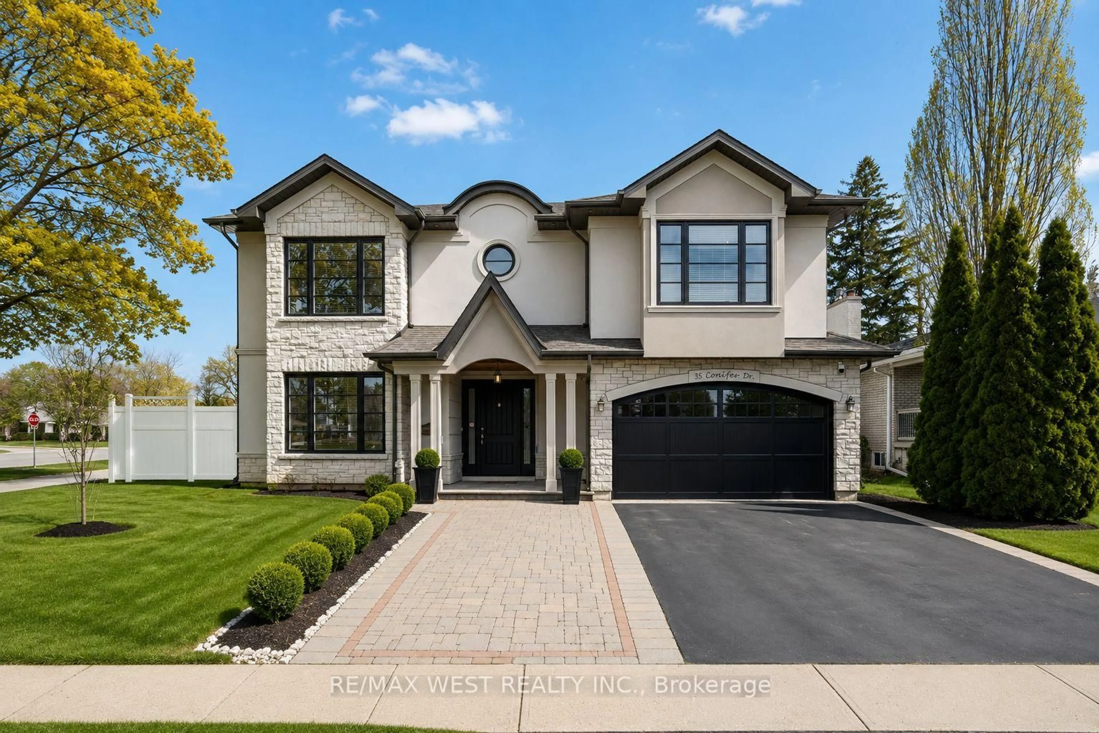 Home with brick exterior material, street for 35 Conifer Dr, Toronto Ontario M9C 1X3