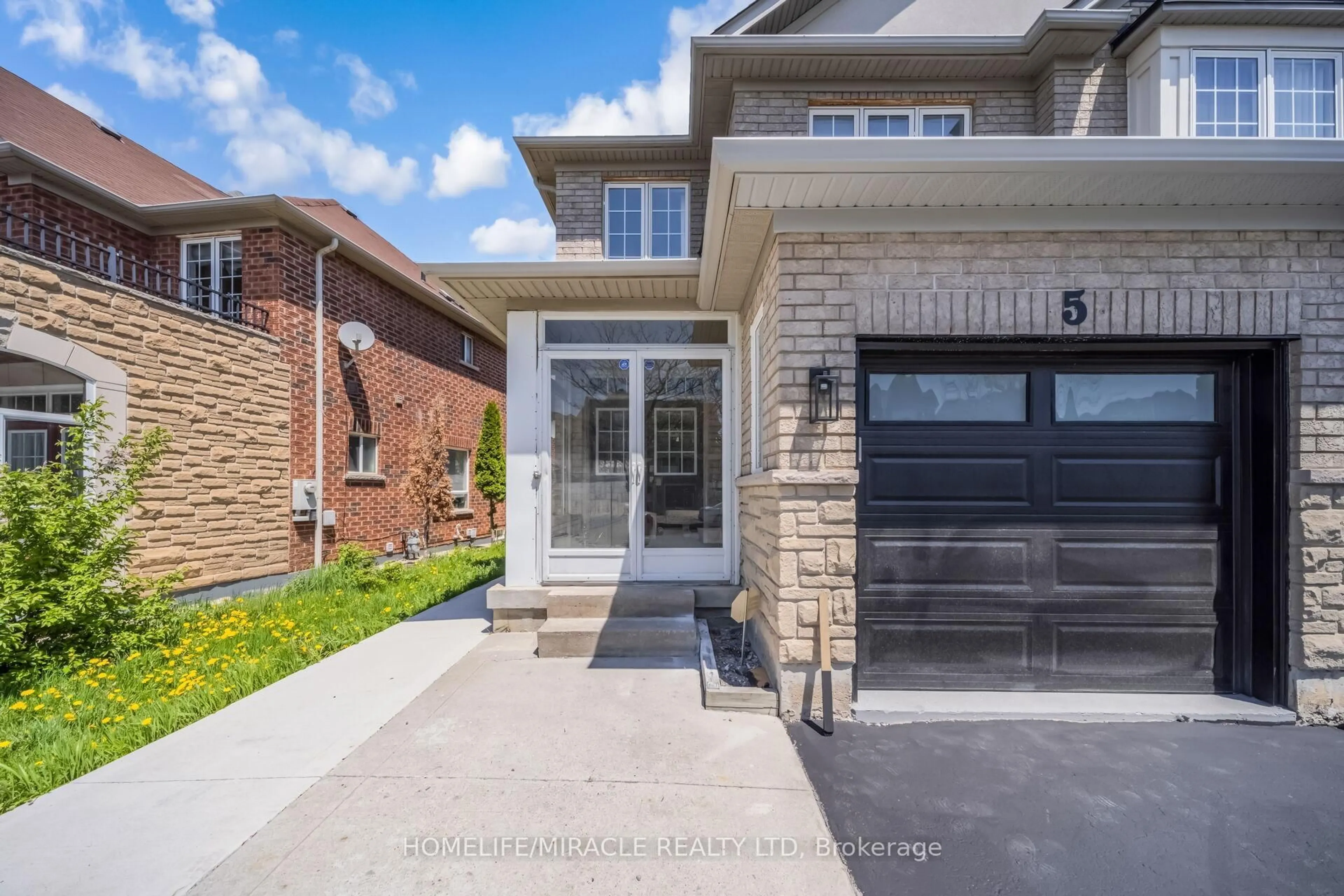 Home with brick exterior material, street for 5 Cherryplum Way, Brampton Ontario L6S 6J8