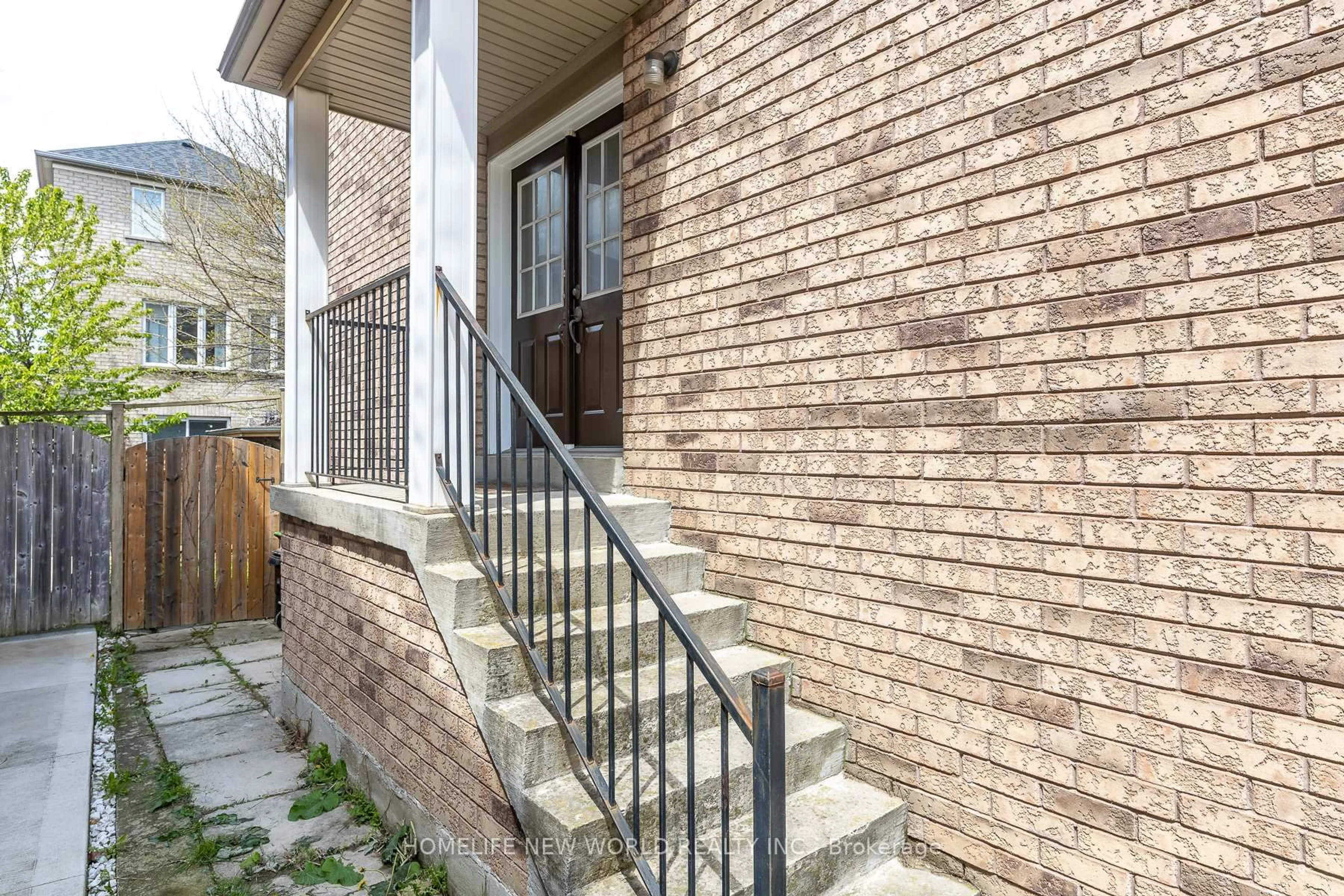 Home with brick exterior material, street for 12 Touchstone Dr, Toronto Ontario M6M 5L2