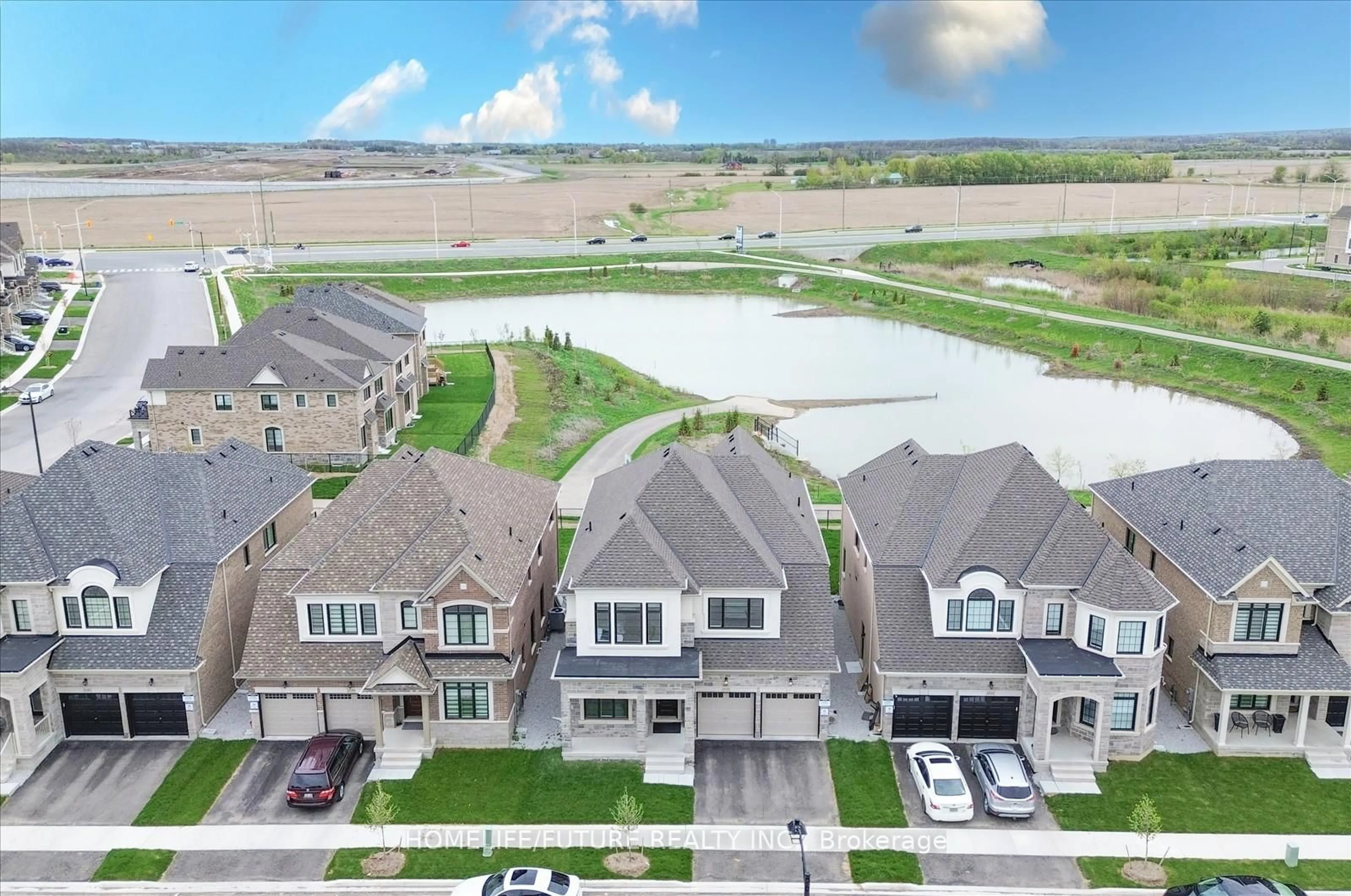A pic from outside/outdoor area/front of a property/back of a property/a pic from drone, water/lake/river/ocean view for 1535 Buttercup Crt, Milton Ontario L9E 2G3