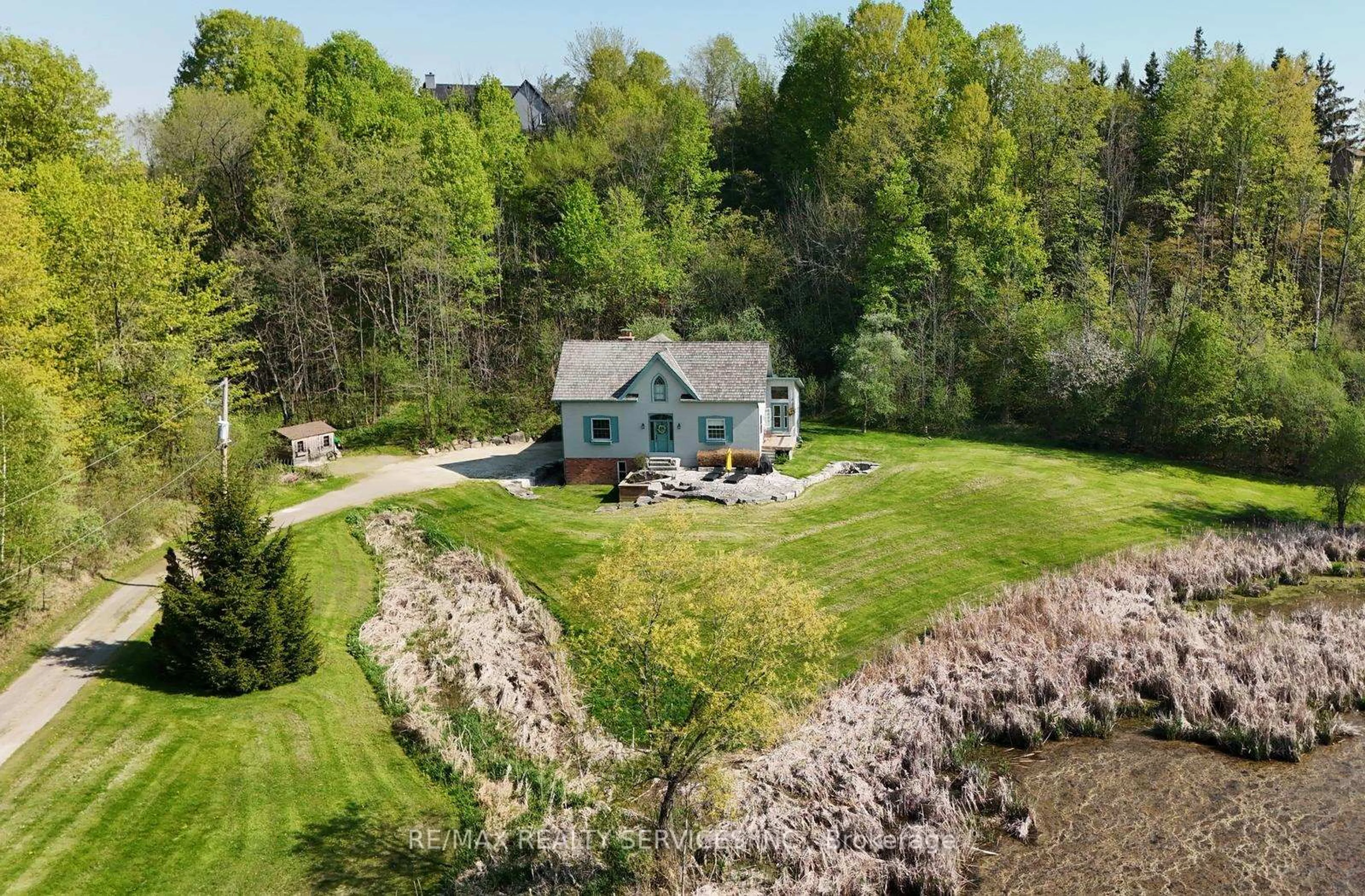 A pic from outside/outdoor area/front of a property/back of a property/a pic from drone, water/lake/river/ocean view for 15951 Humber Station Rd, Caledon Ontario L7E 3A3