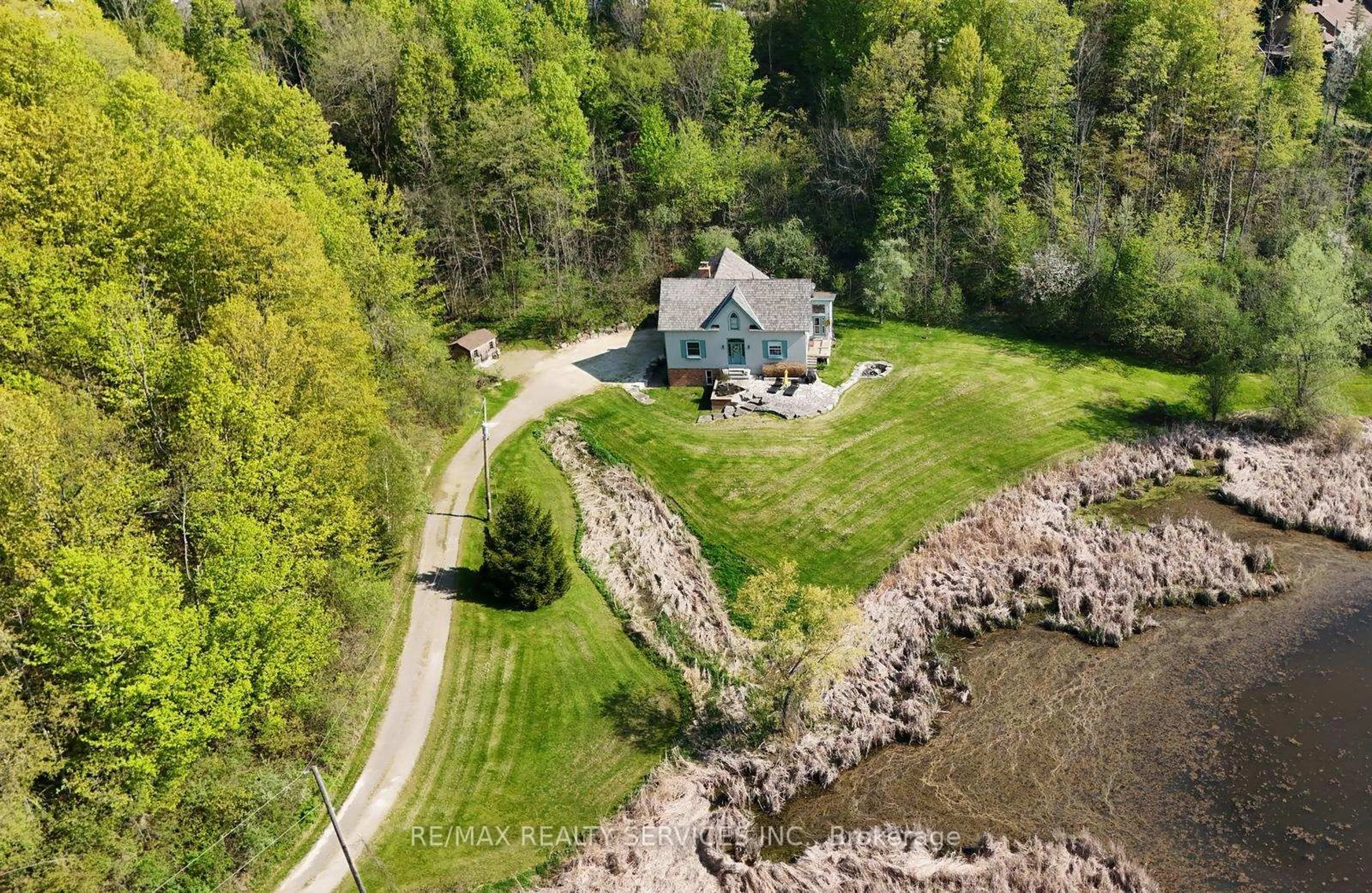 A pic from outside/outdoor area/front of a property/back of a property/a pic from drone, water/lake/river/ocean view for 15951 Humber Station Rd, Caledon Ontario L7E 3A3