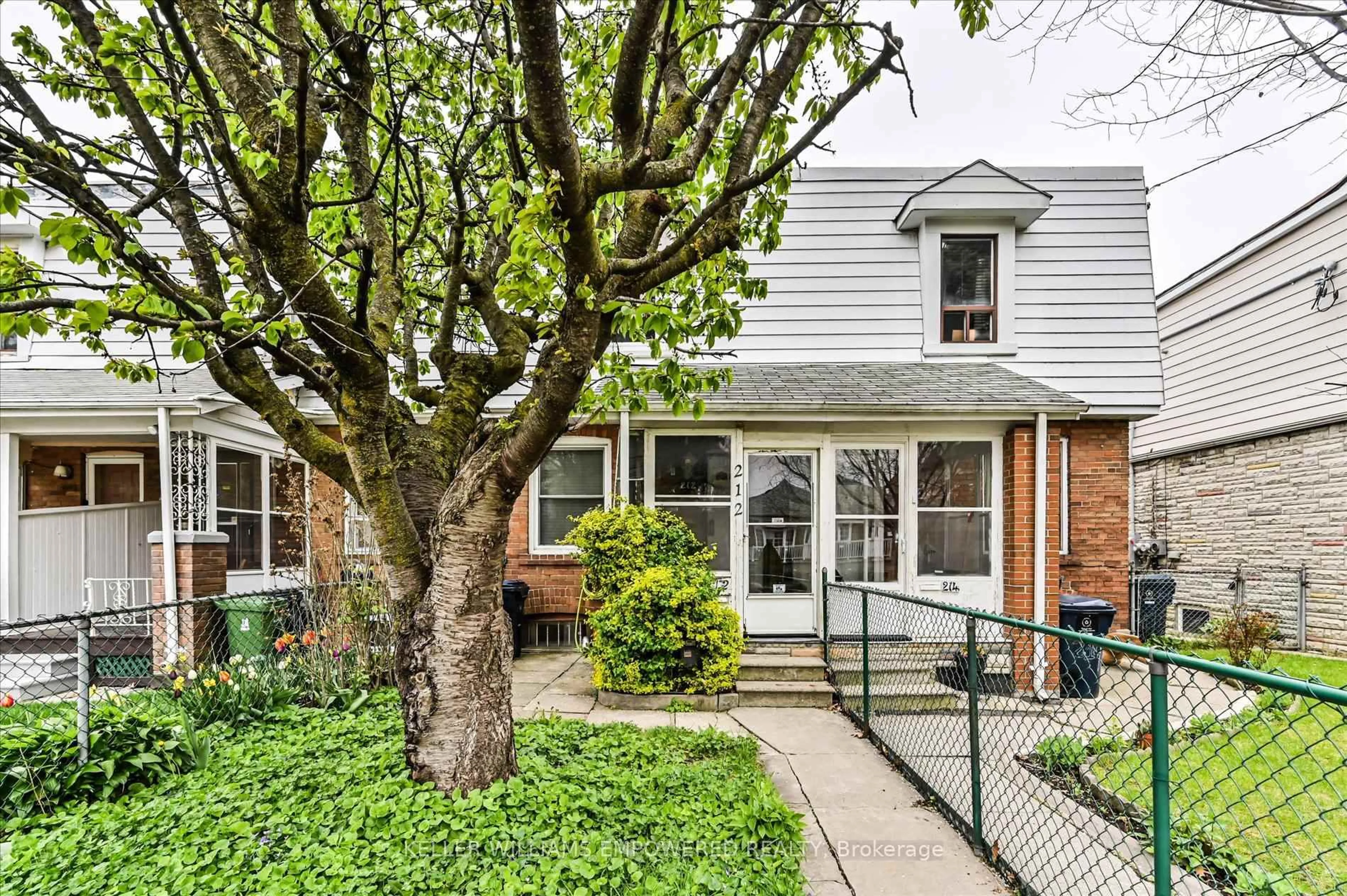 Home with brick exterior material, street for 212 Silverthorn Ave, Toronto Ontario M6N 3K4