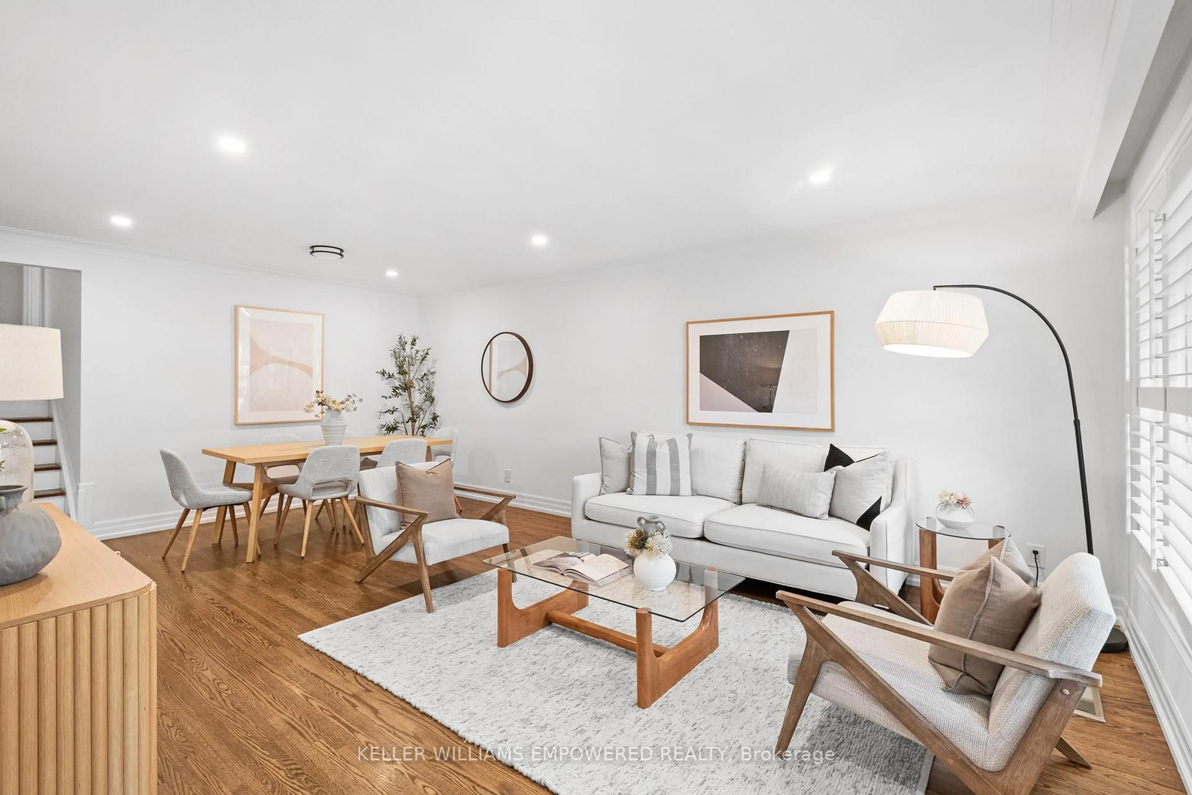 Living room with furniture, wood/laminate floor for 25 Bloorlea Cres, Toronto Ontario M9B 1P2