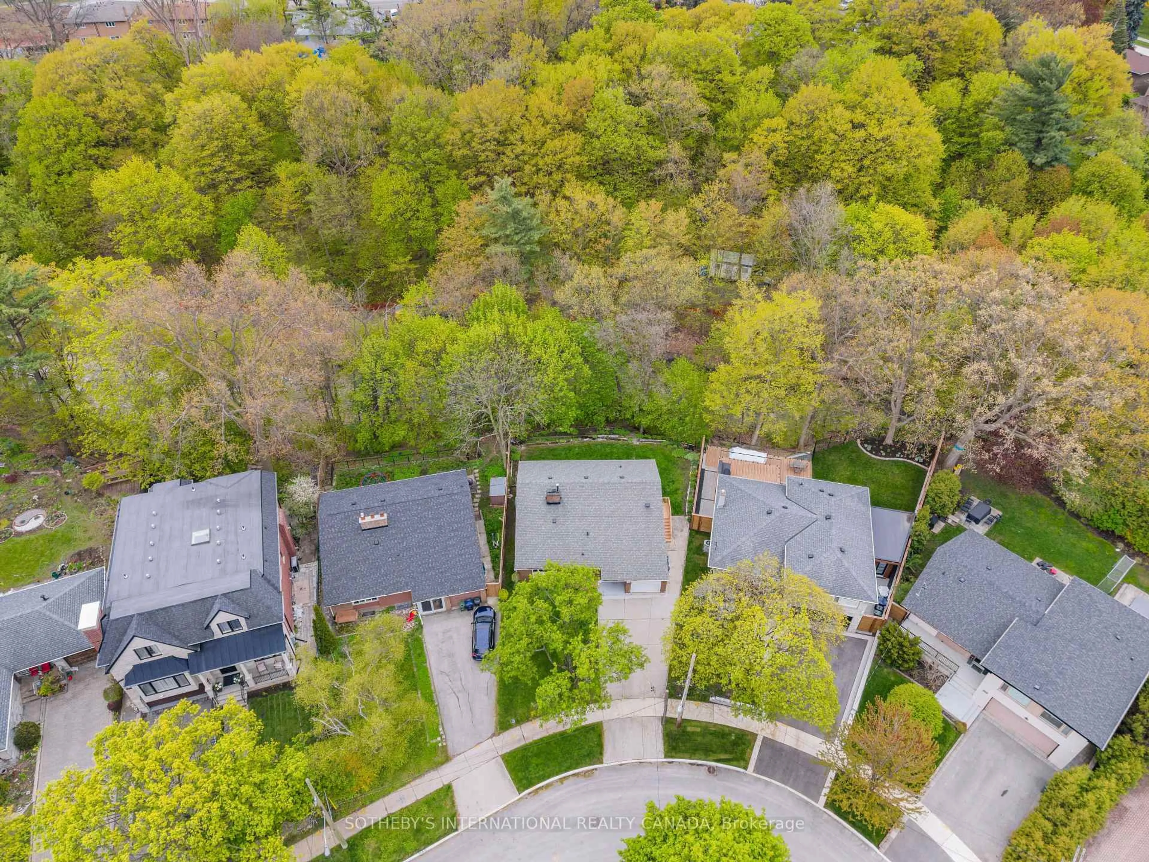 A pic from outside/outdoor area/front of a property/back of a property/a pic from drone, forest/trees view for 15 Saxony Cres, Toronto Ontario M9P 1S2