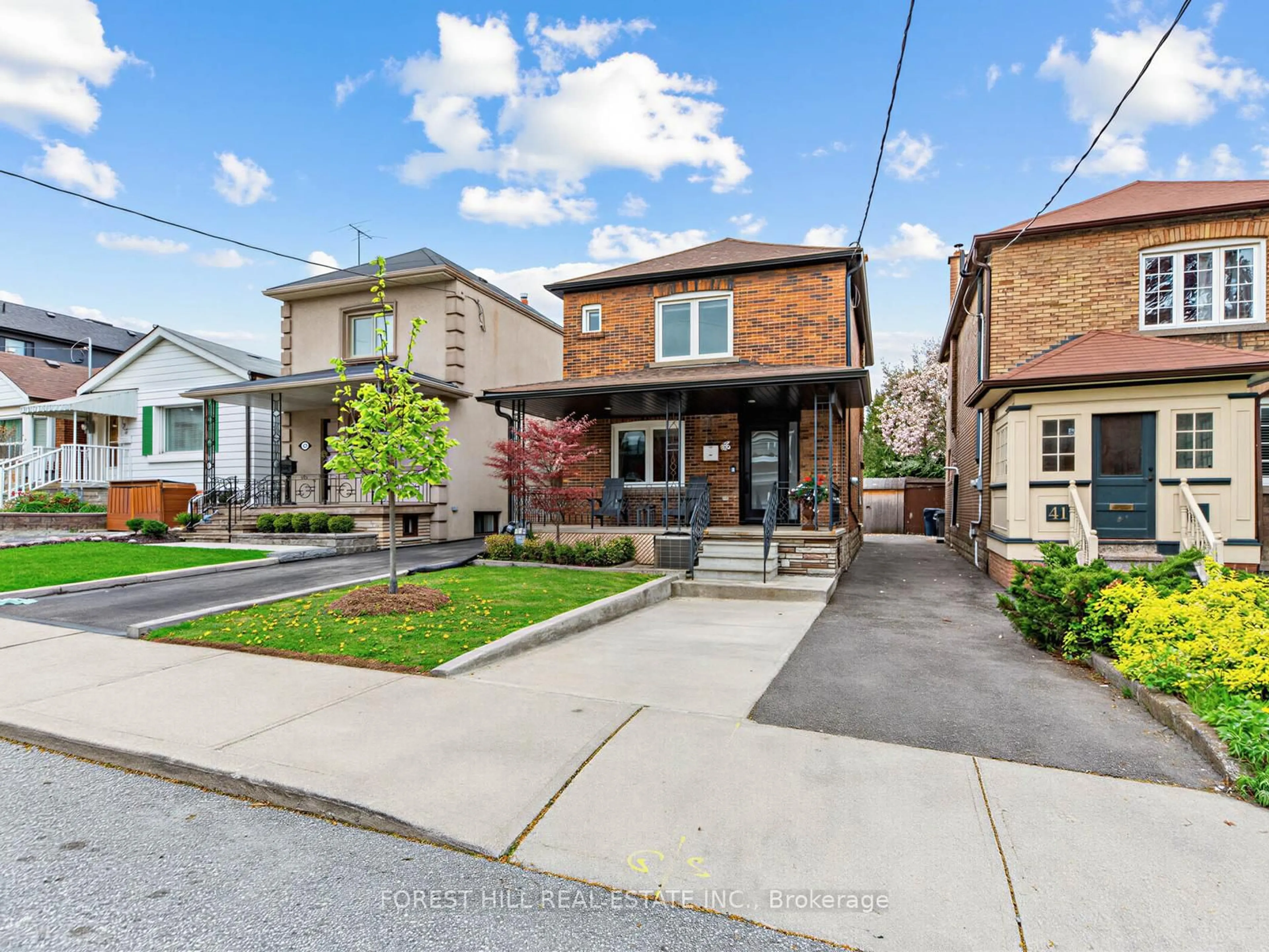 Home with brick exterior material, street for 39 Belgravia Ave, Toronto Ontario M6E 2M4