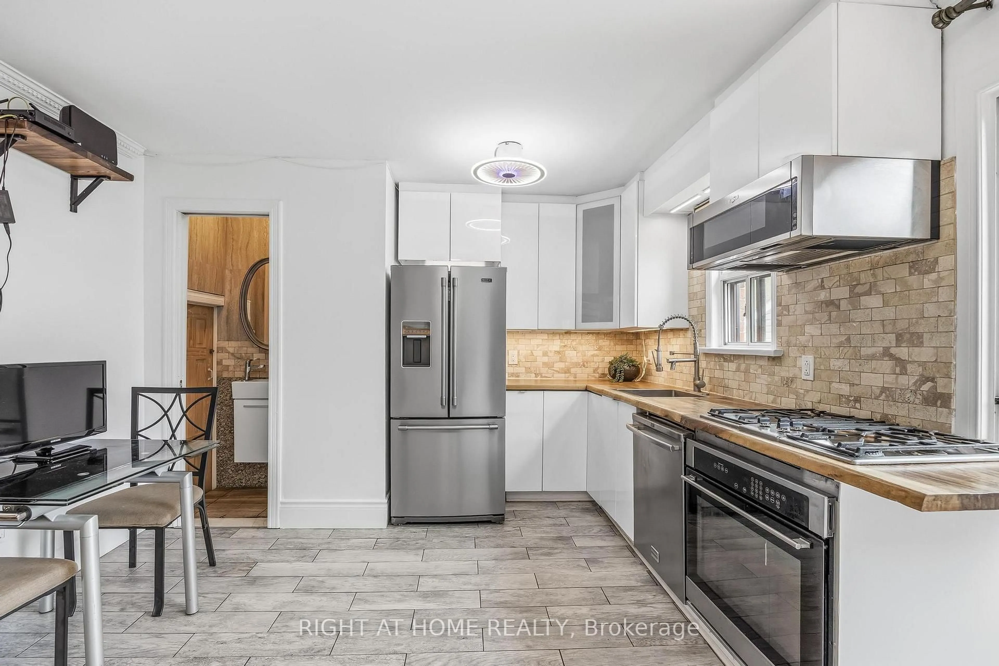 Standard kitchen, ceramic/tile floor for 35 Dayton Ave, Toronto Ontario M8Z 3L8