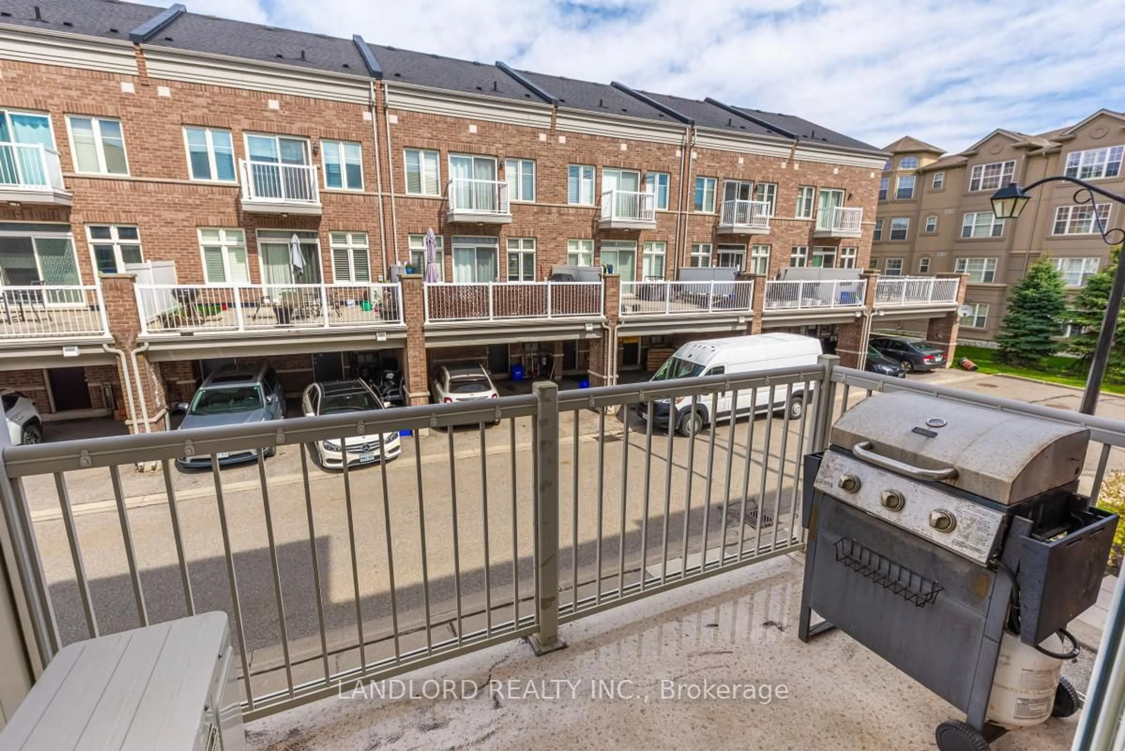 A pic from outside/outdoor area/front of a property/back of a property/a pic from drone, street for 165 Hampshire Way #50, Milton Ontario L9T 8M7