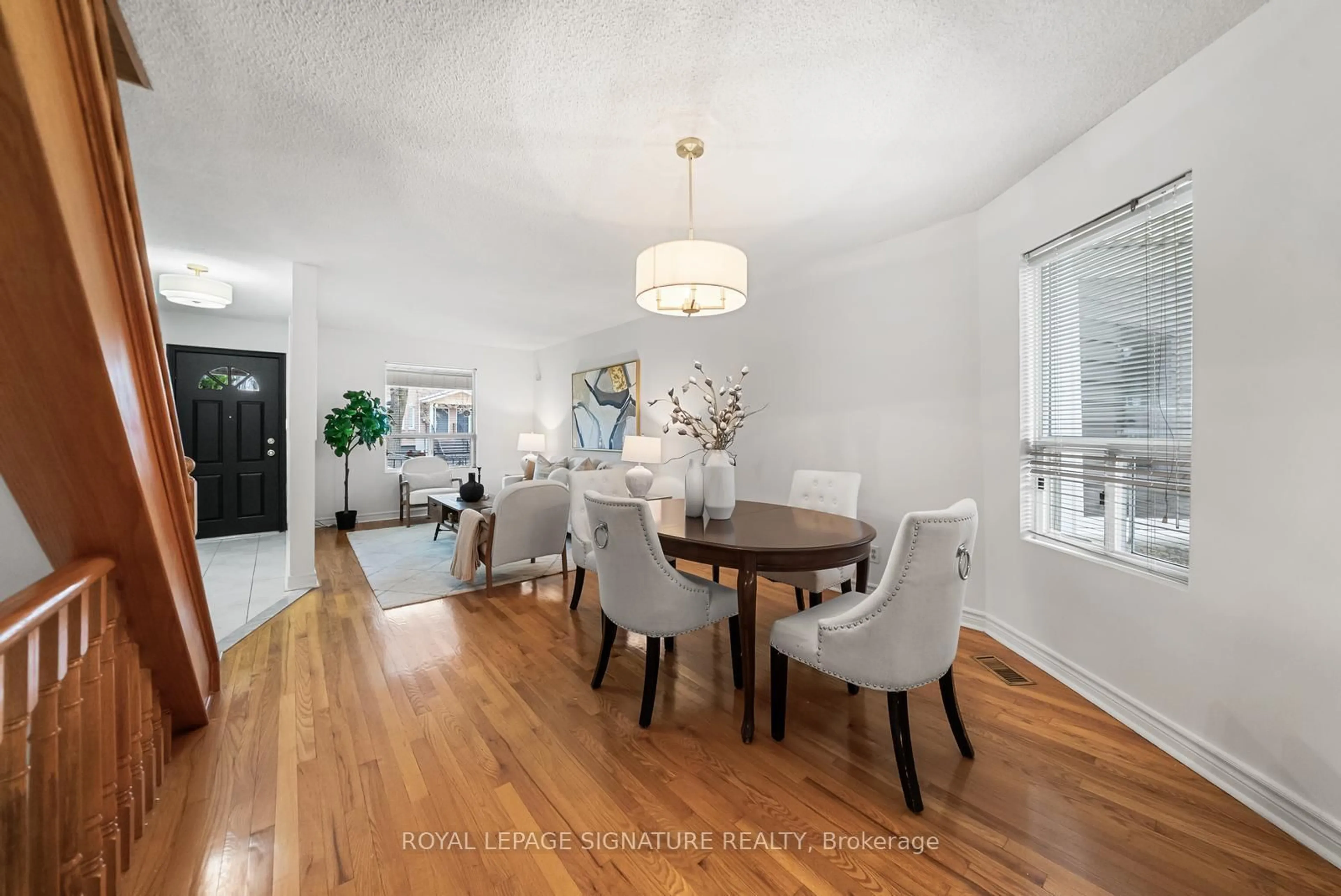 Dining room, wood/laminate floor for 387 Bartlett Ave, Toronto Ontario M6H 3G8