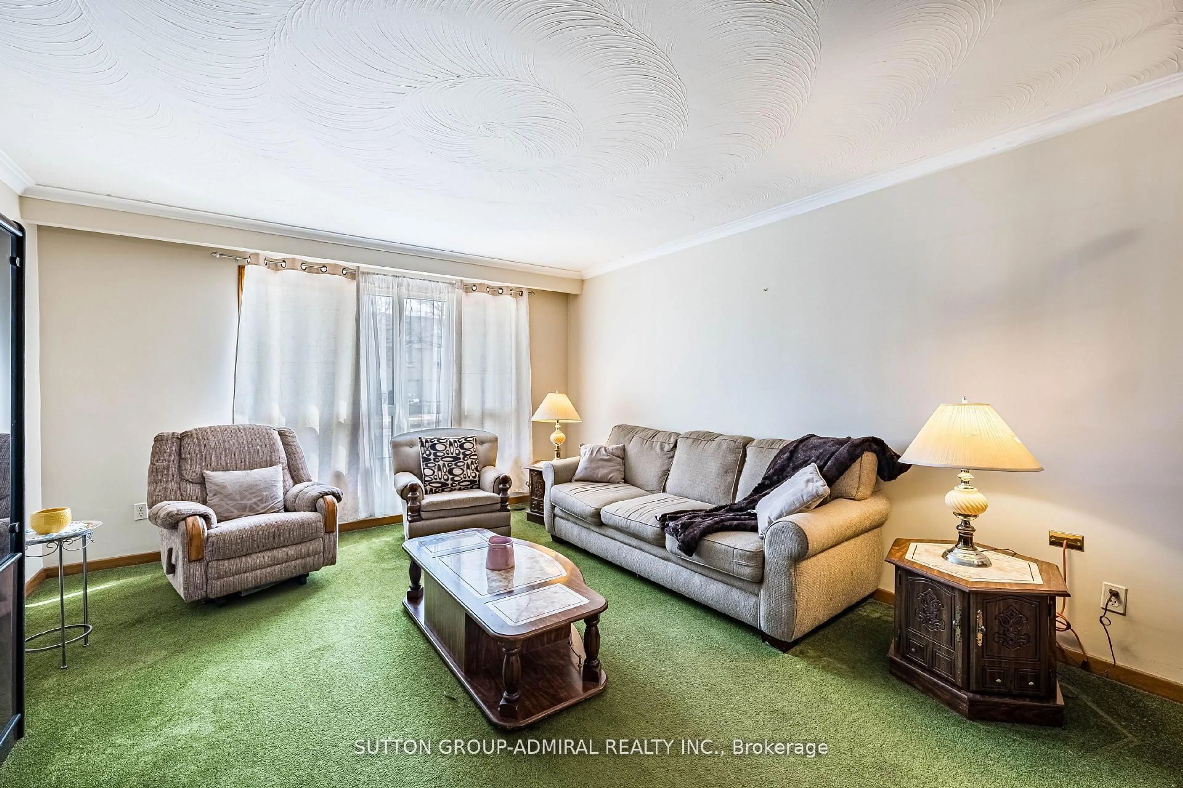 Living room with furniture, carpet floor for 92 Redgrave Dr, Toronto Ontario M9R 3V3
