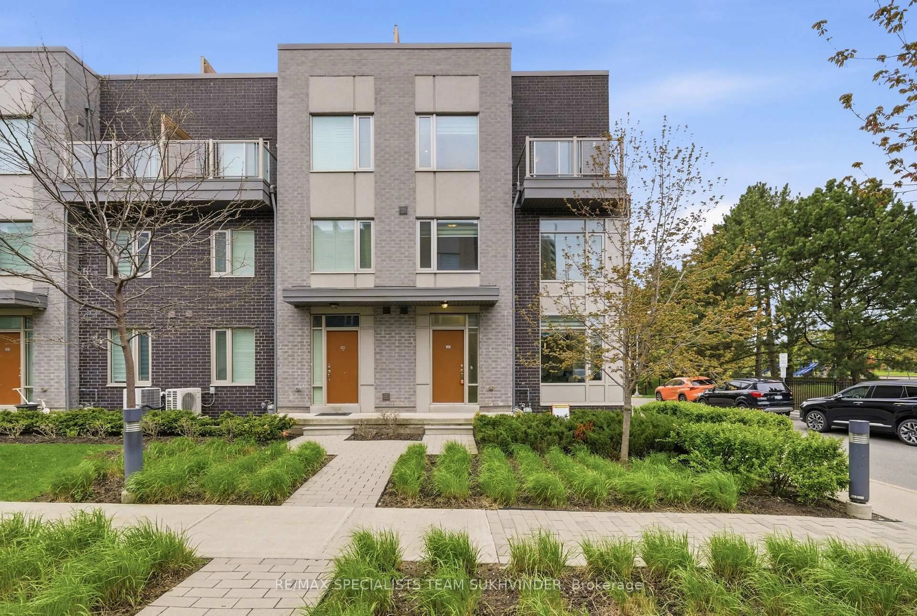 Home with brick exterior material, street for 18 Applewood Lane #25, Toronto Ontario M9C 0C1