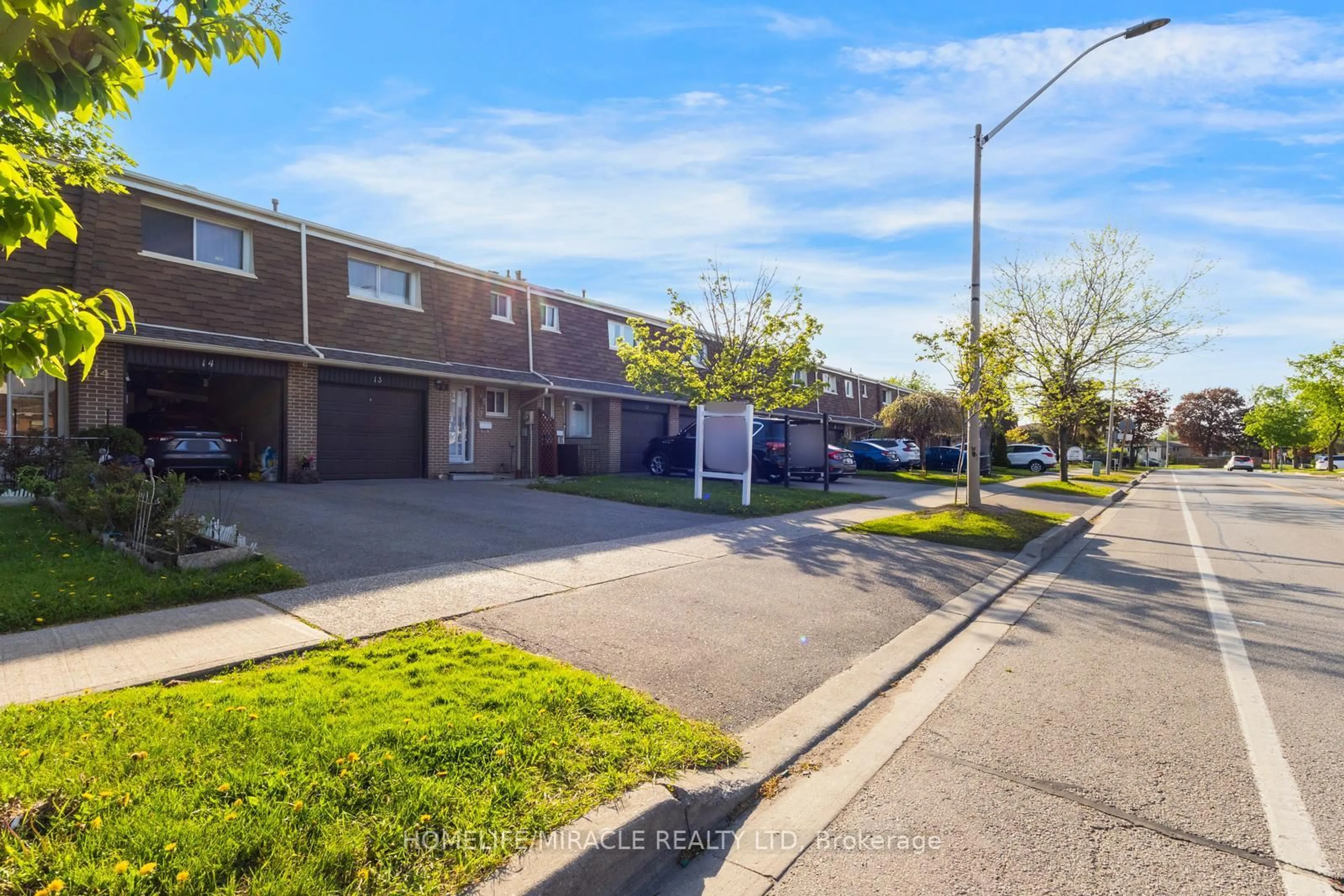 A pic from outside/outdoor area/front of a property/back of a property/a pic from drone, street for 7450 Darcel Ave #13, Mississauga Ontario L4T 2X7
