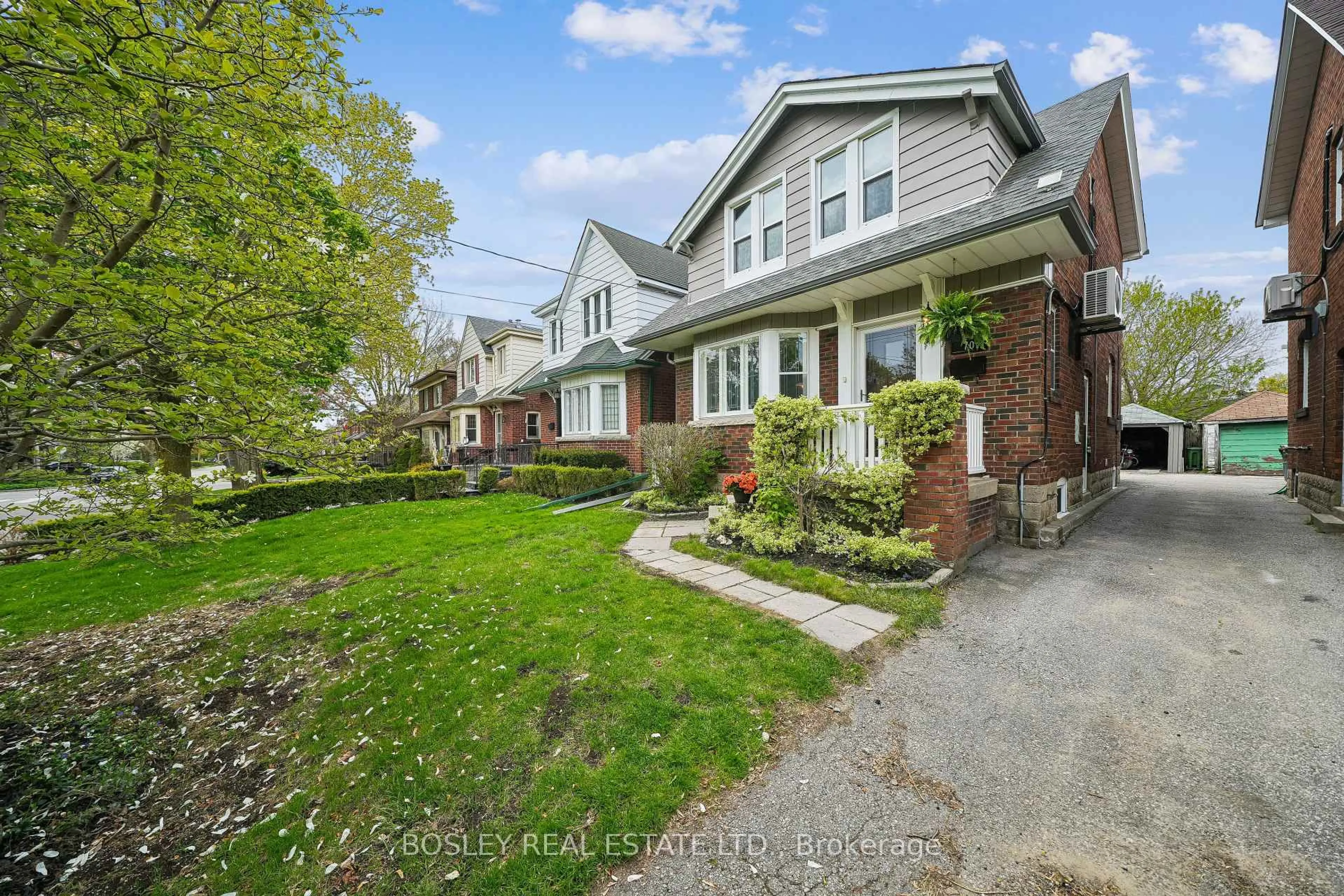Home with brick exterior material, street for 70 Eleventh St, Toronto Ontario M8V 3G5