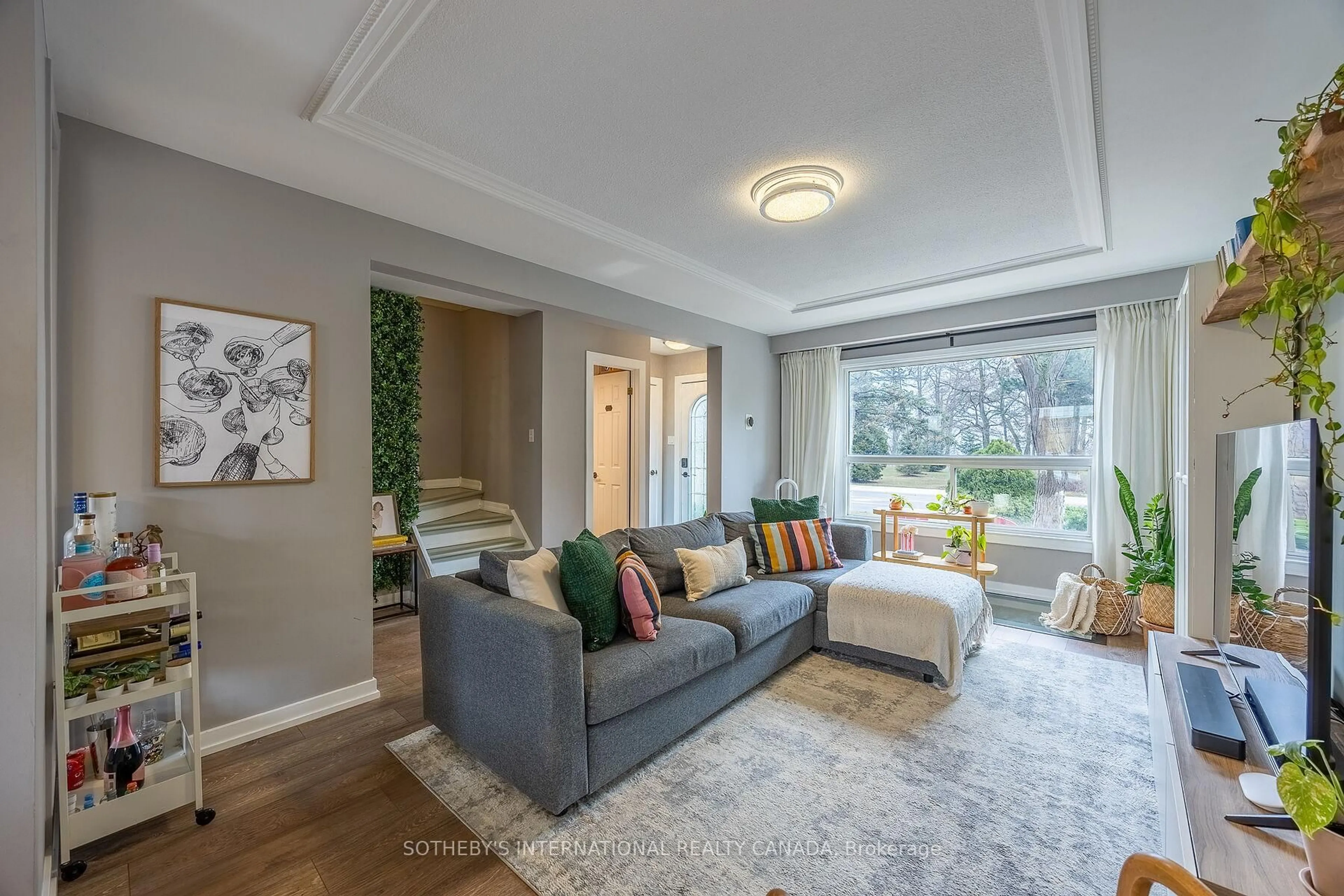Living room with furniture, unknown for 5475 Lakeshore Rd #113, Burlington Ontario L7L 1E1