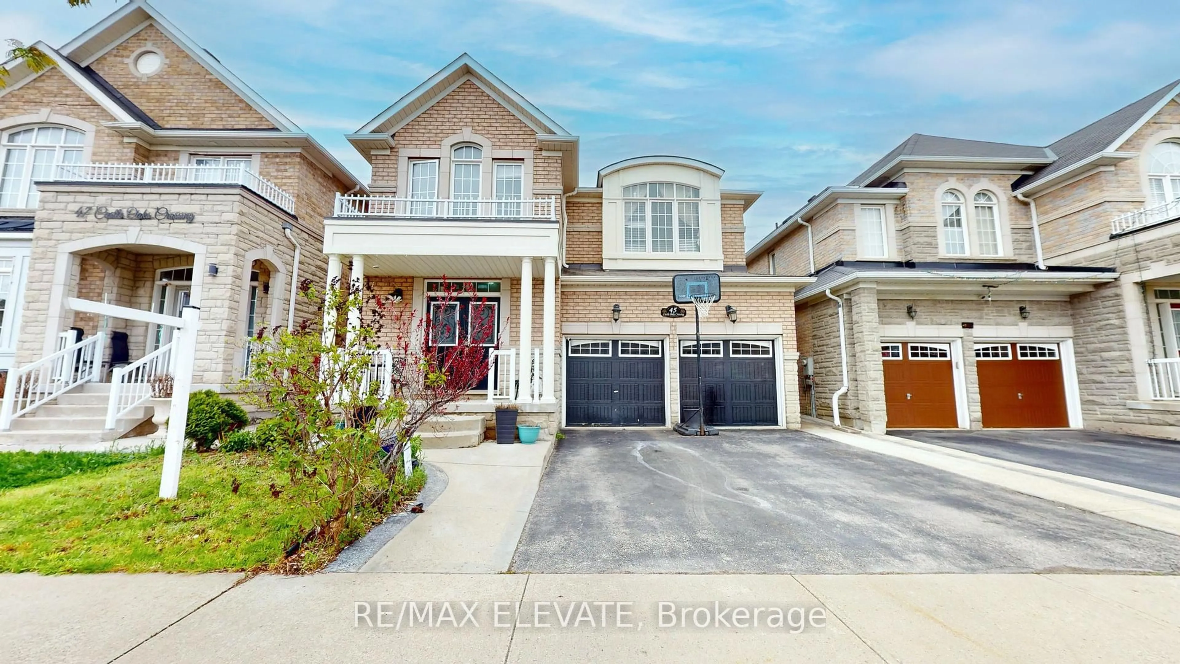 Home with brick exterior material, street for 45 Castle Oaks Cross, Brampton Ontario L6P 3G9