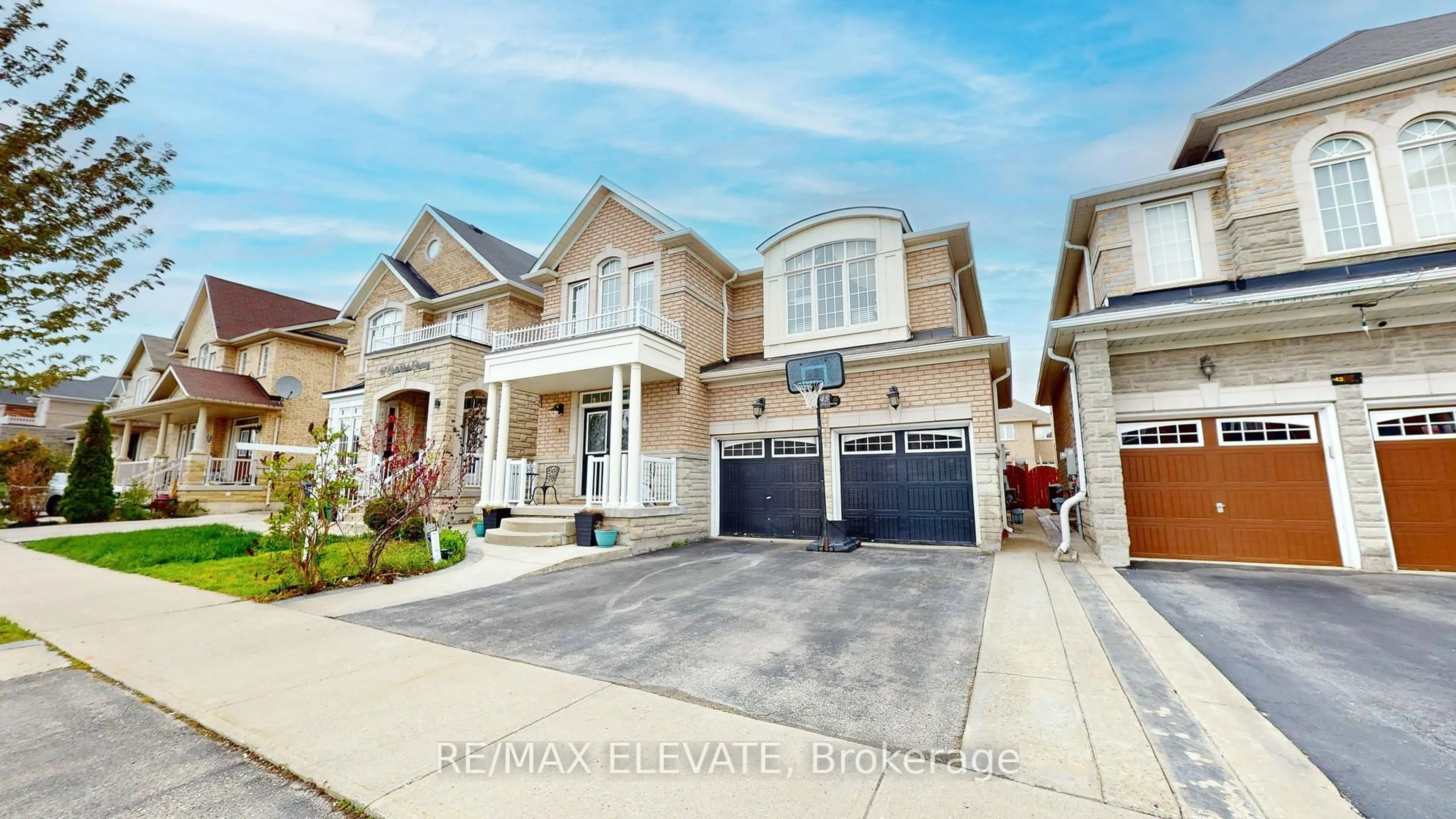Home with brick exterior material, street for 45 Castle Oaks Cross, Brampton Ontario L6P 3G9