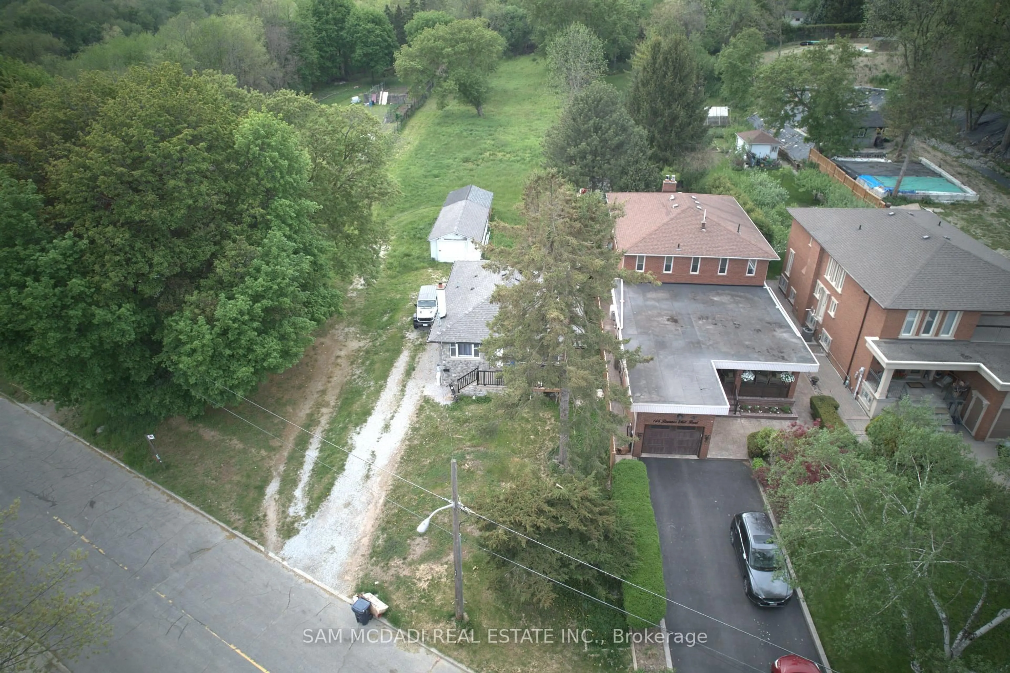 A pic from outside/outdoor area/front of a property/back of a property/a pic from drone, unknown for 148 Rowntree Mill Rd #Road, Toronto Ontario M9L 1C9