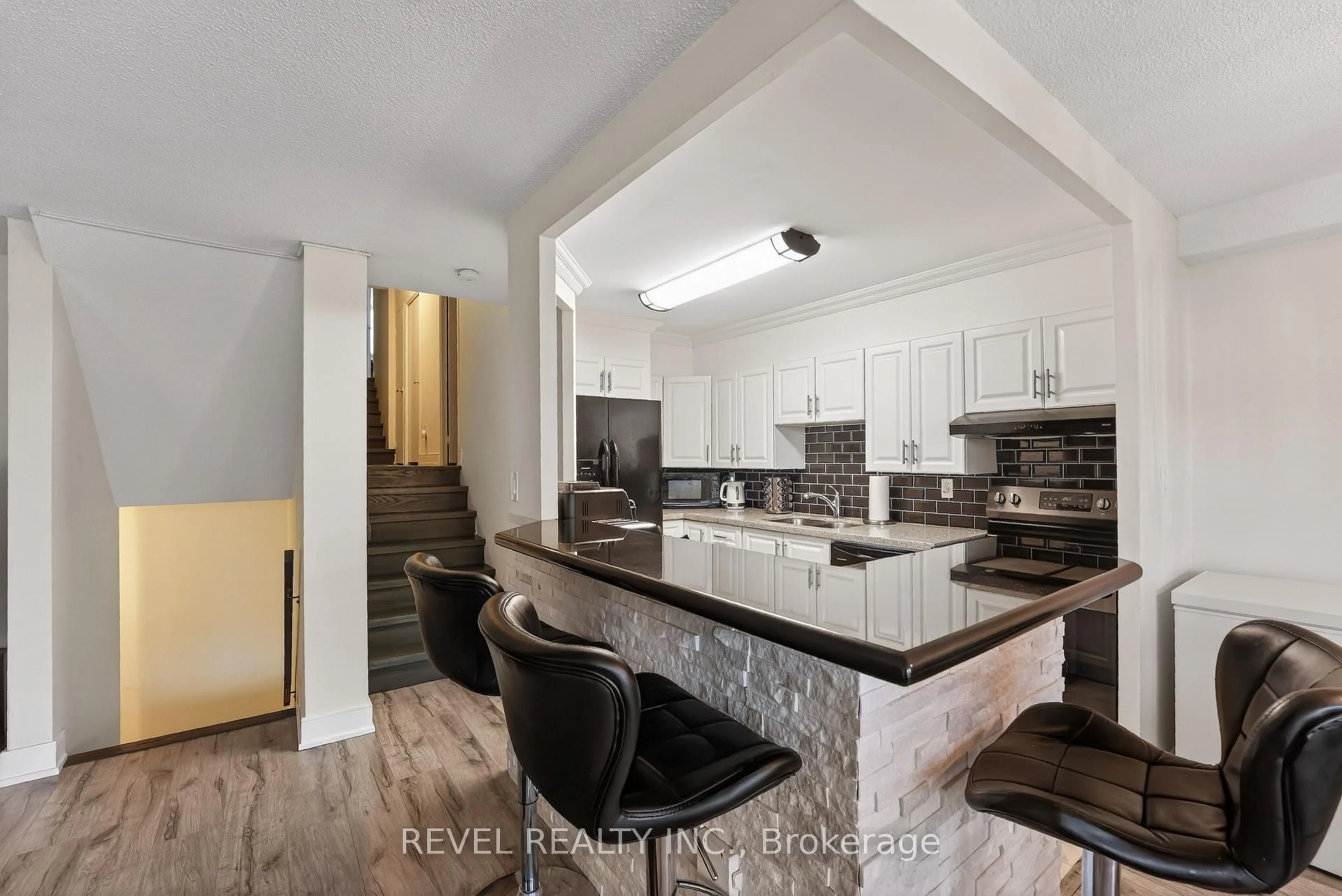 Open concept kitchen, ceramic/tile floor for 11 Wincott Dr #403, Toronto Ontario M9R 2R9
