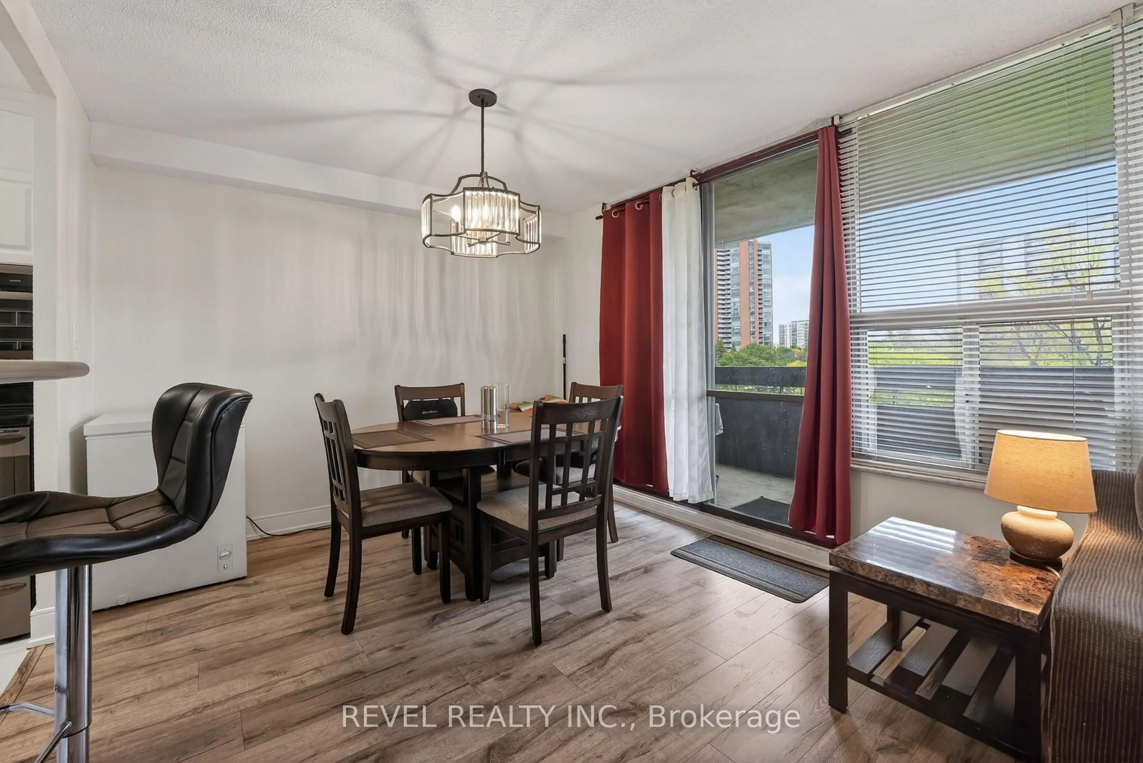Dining room, wood/laminate floor for 11 Wincott Dr #403, Toronto Ontario M9R 2R9