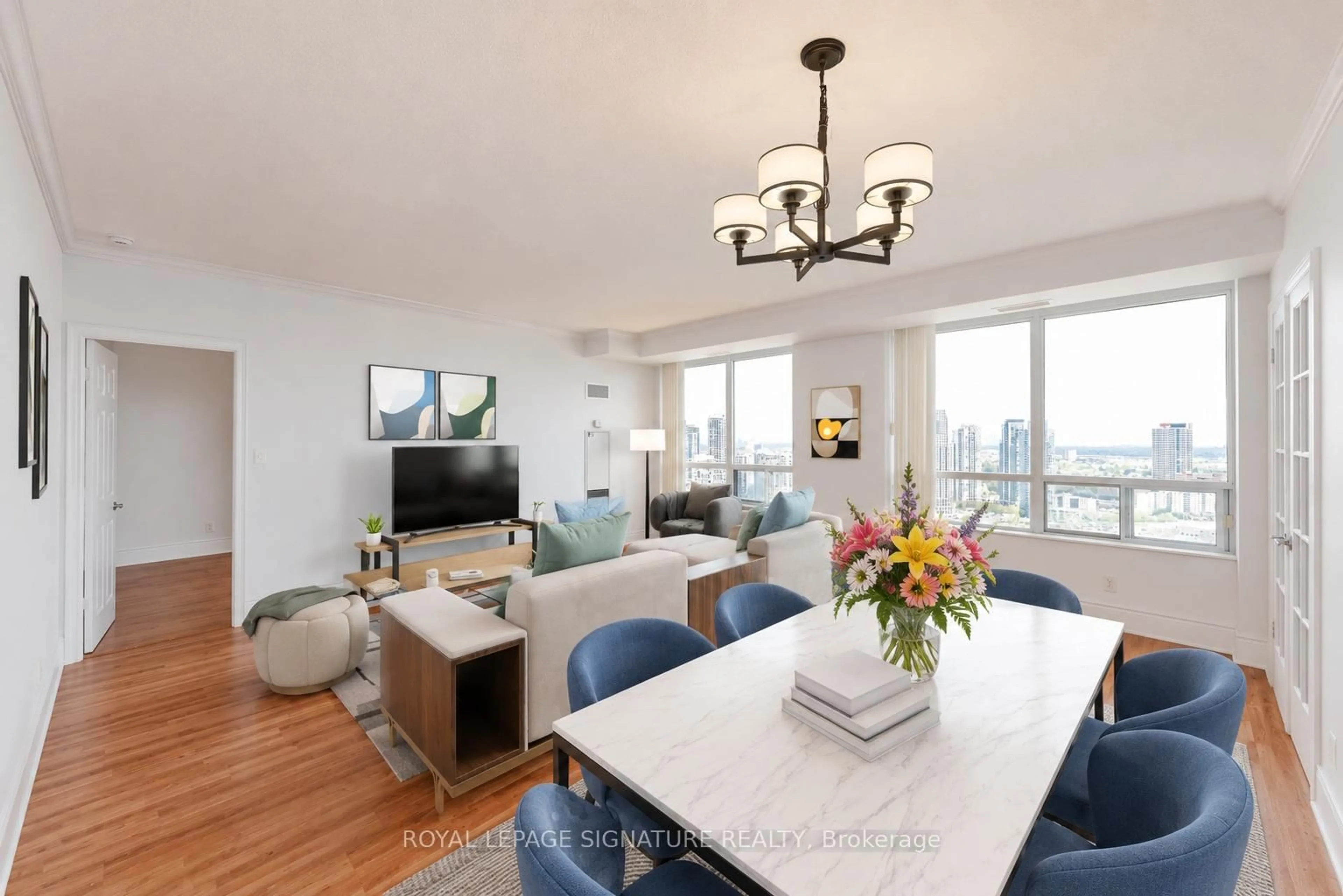 Living room with furniture, wood/laminate floor for 3880 Duke of York Blvd #2907, Mississauga Ontario L5B 4M7