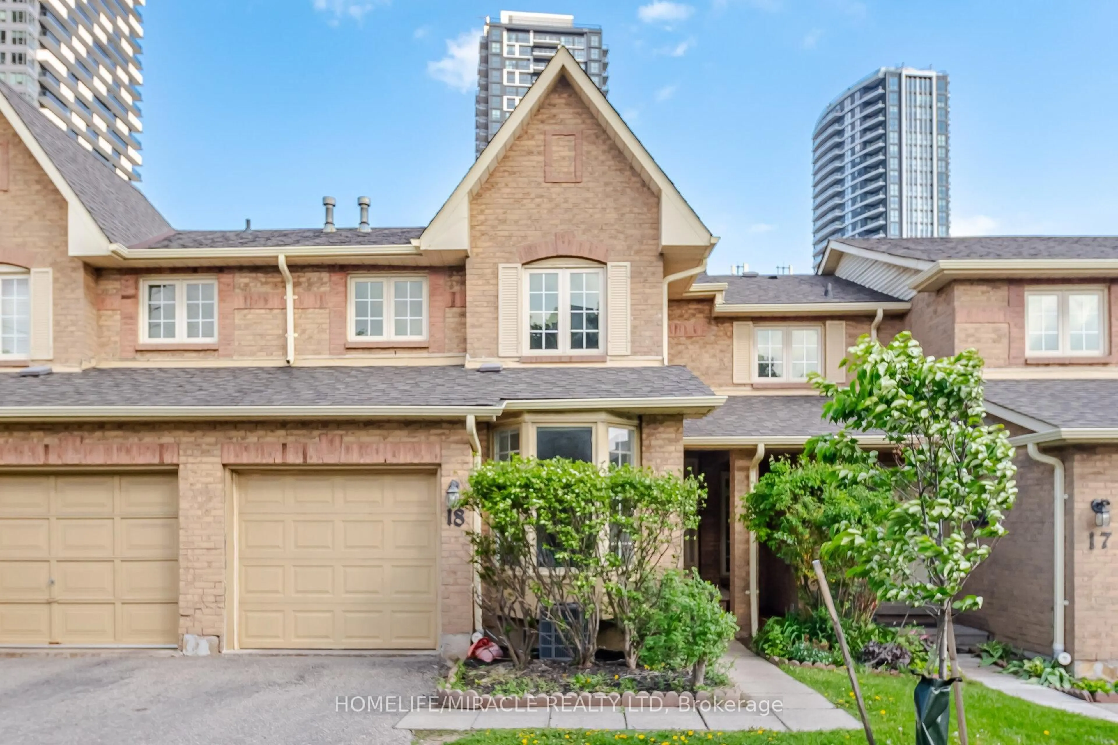 Home with brick exterior material, street for 35 Ceremonial Dr #18, Mississauga Ontario L5R 3G6