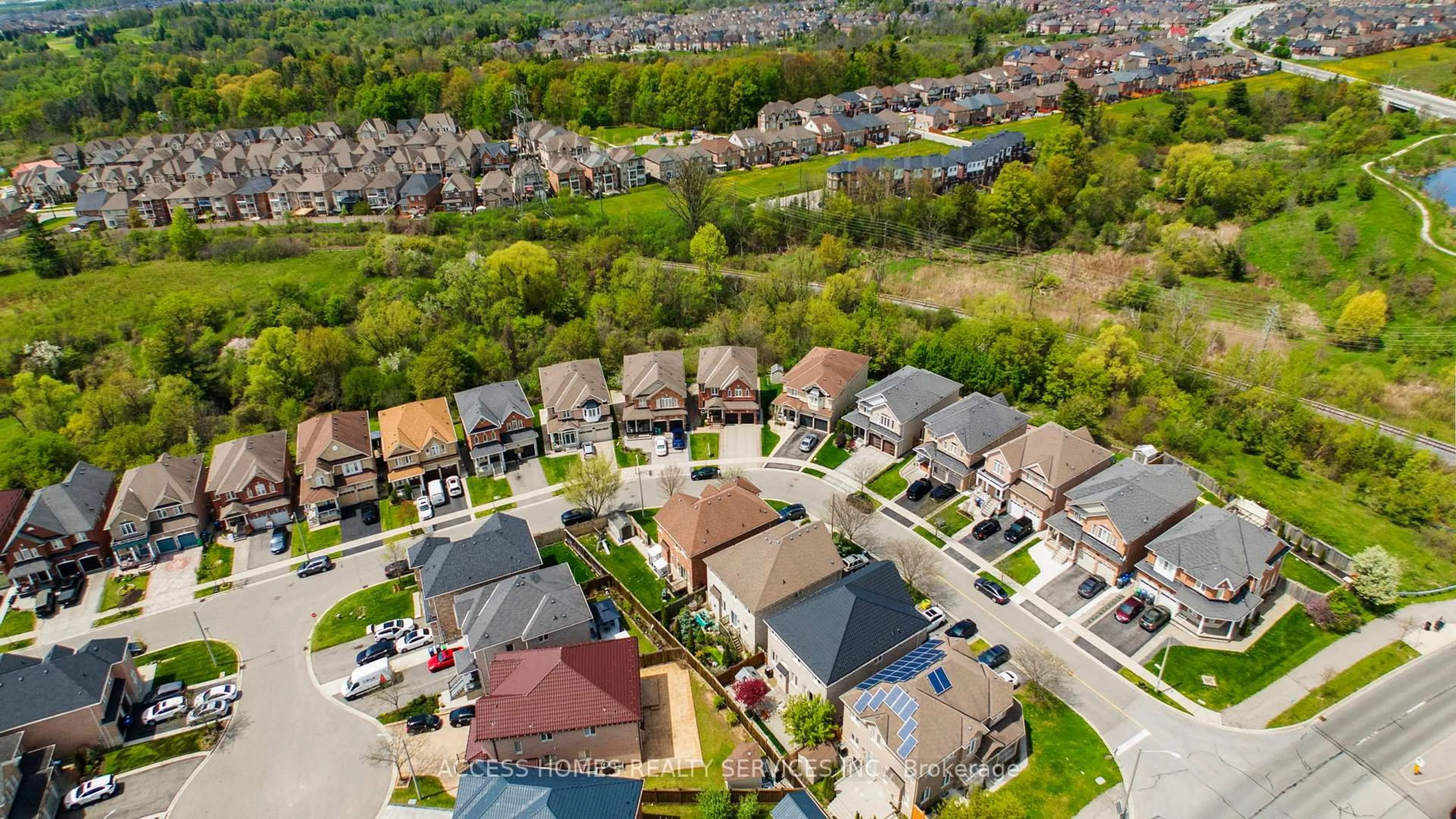 A pic from outside/outdoor area/front of a property/back of a property/a pic from drone, street for 14 Fahey Dr, Brampton Ontario L6Y 0N7