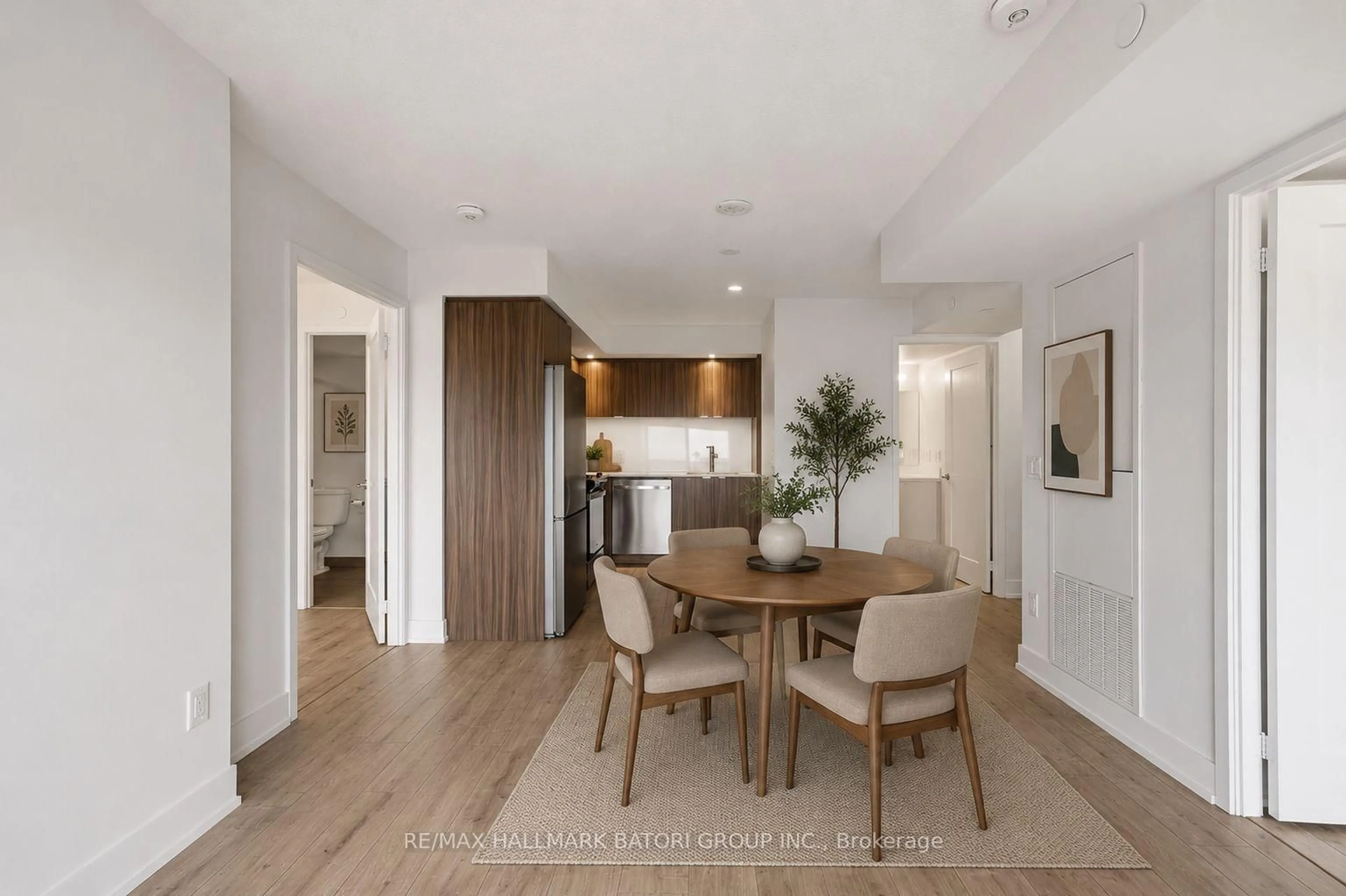 Open concept kitchen, wood/laminate floor for 10 Eva Rd #1505, Toronto Ontario M9C 1E8